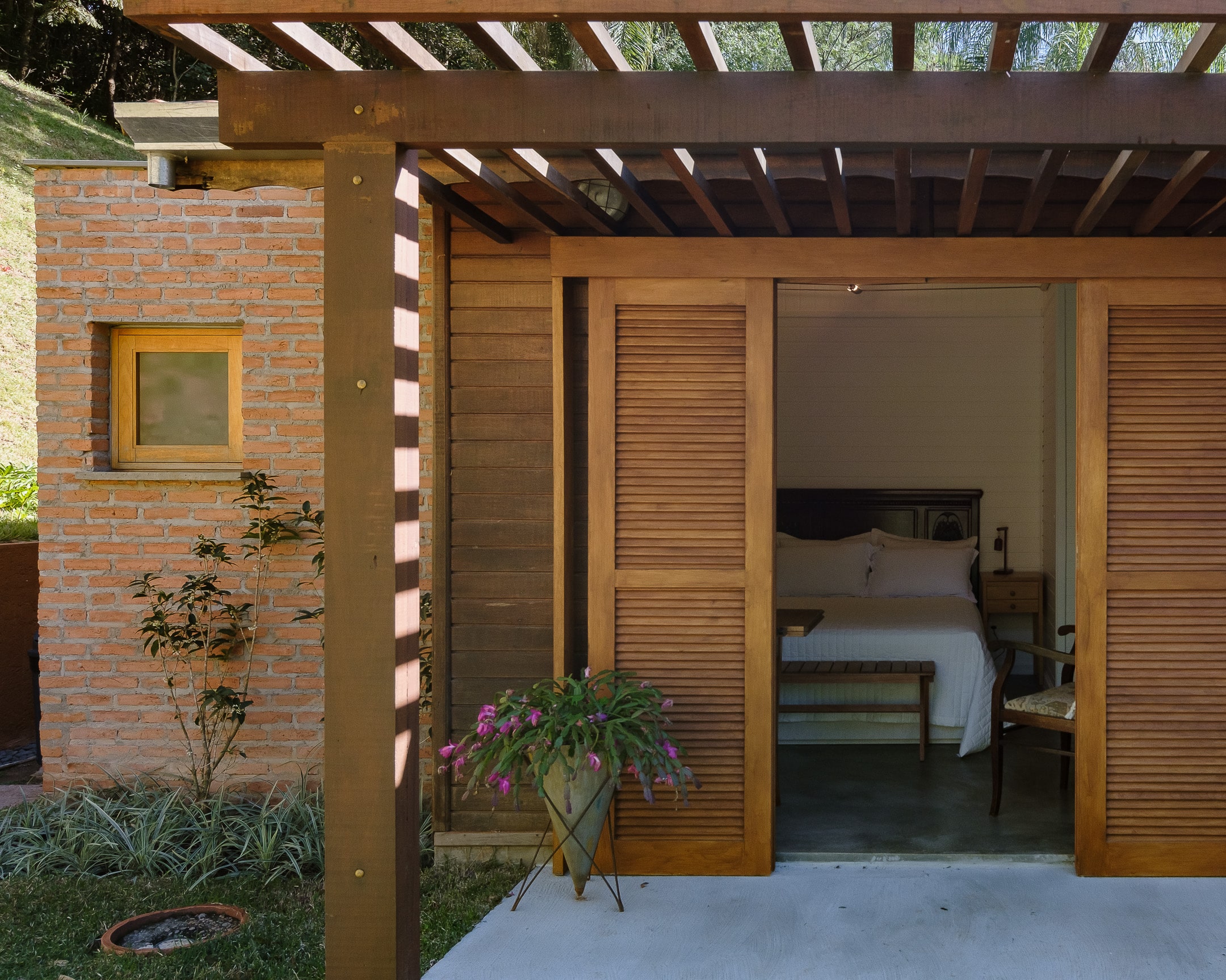 Slatted French doors that open out onto a veranda