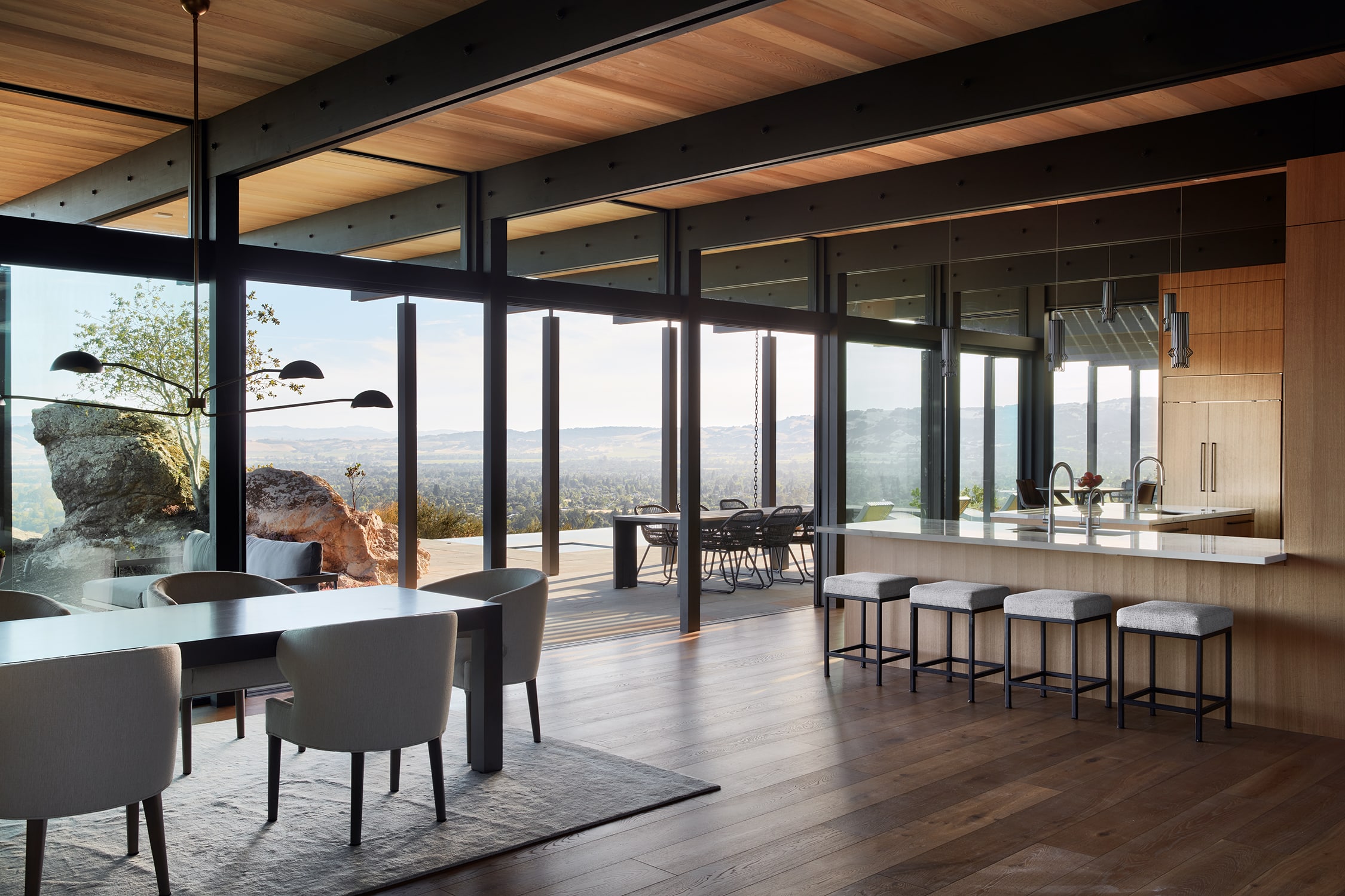 Open-concept living space within rectilinear house in California