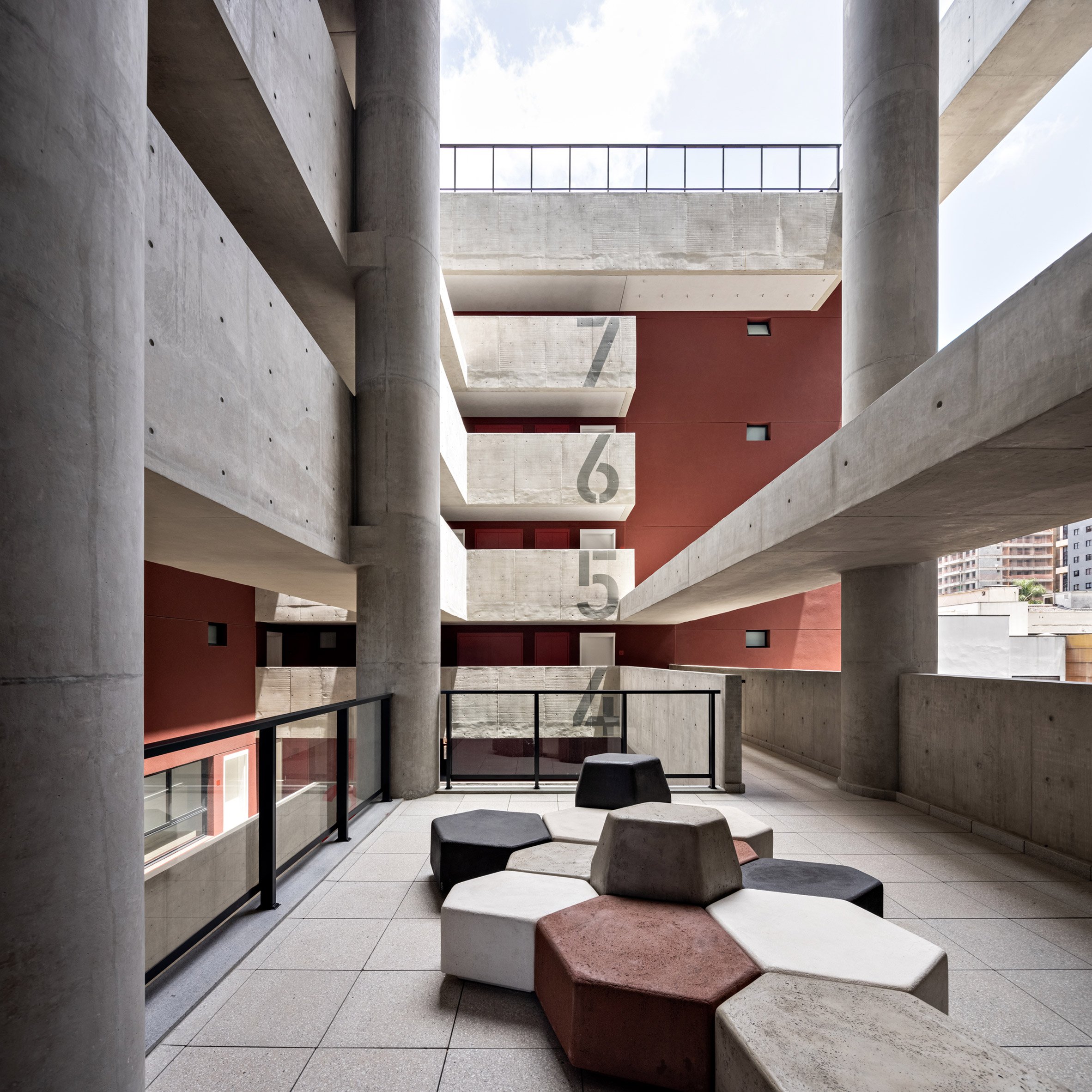 Concrete walkways and seats in POD Pinheiros