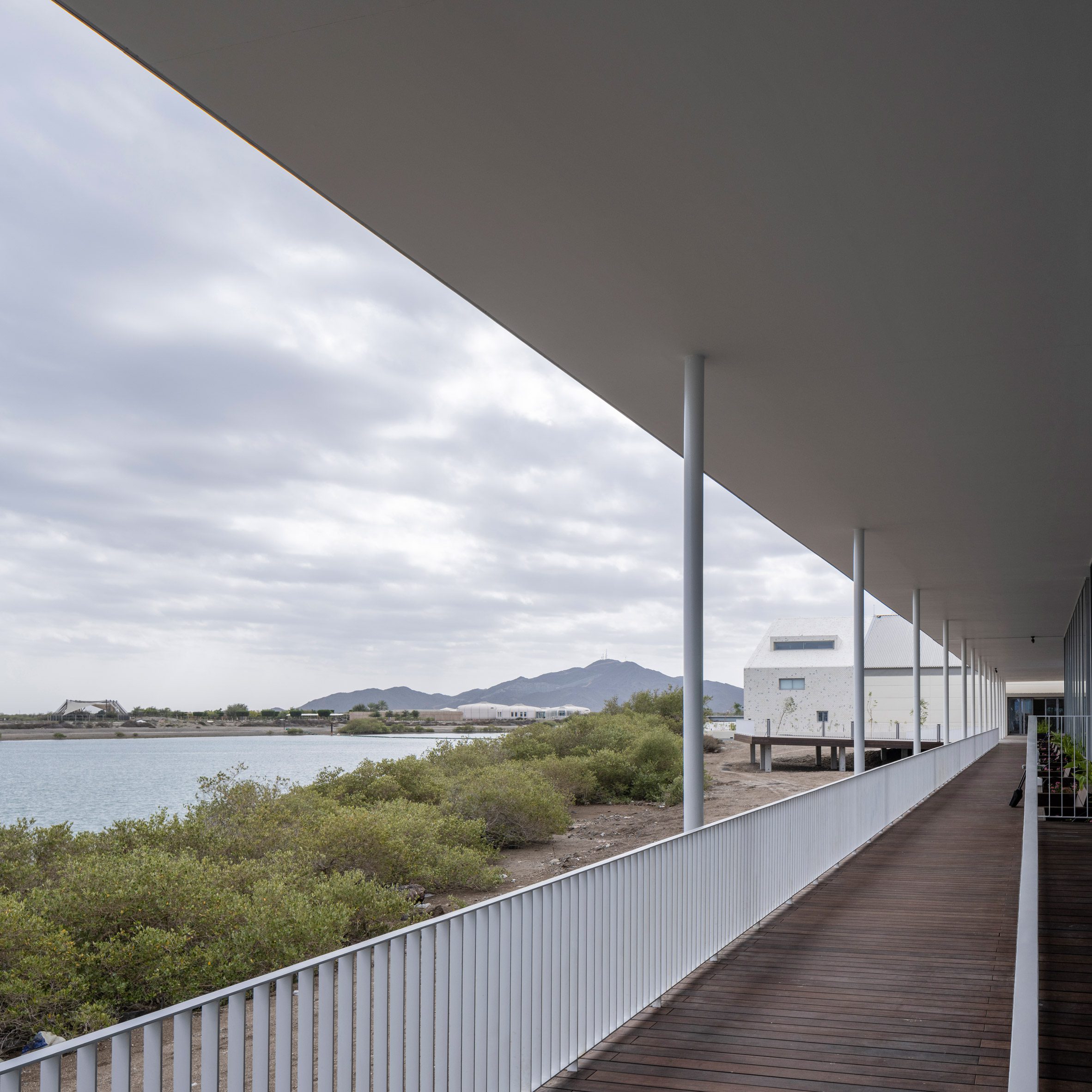Covered walkway with view of Kalba Creek