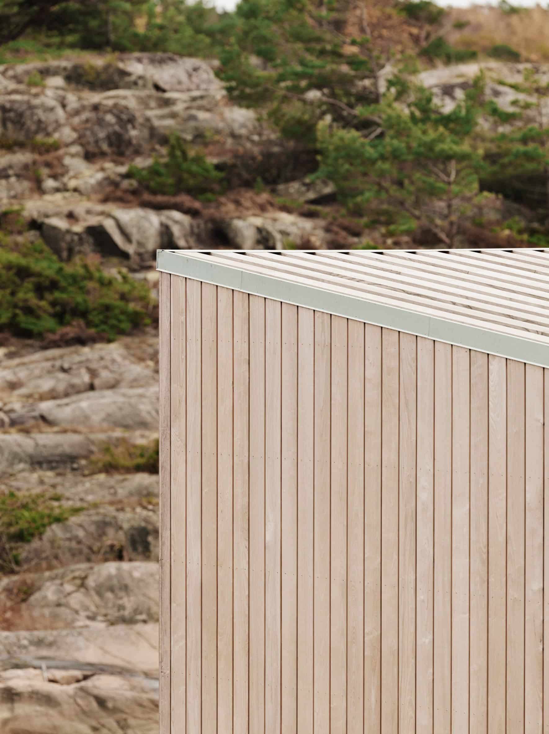 Ash cladding of Kjerringholmen cabin by Line Solgaard Arkitekter