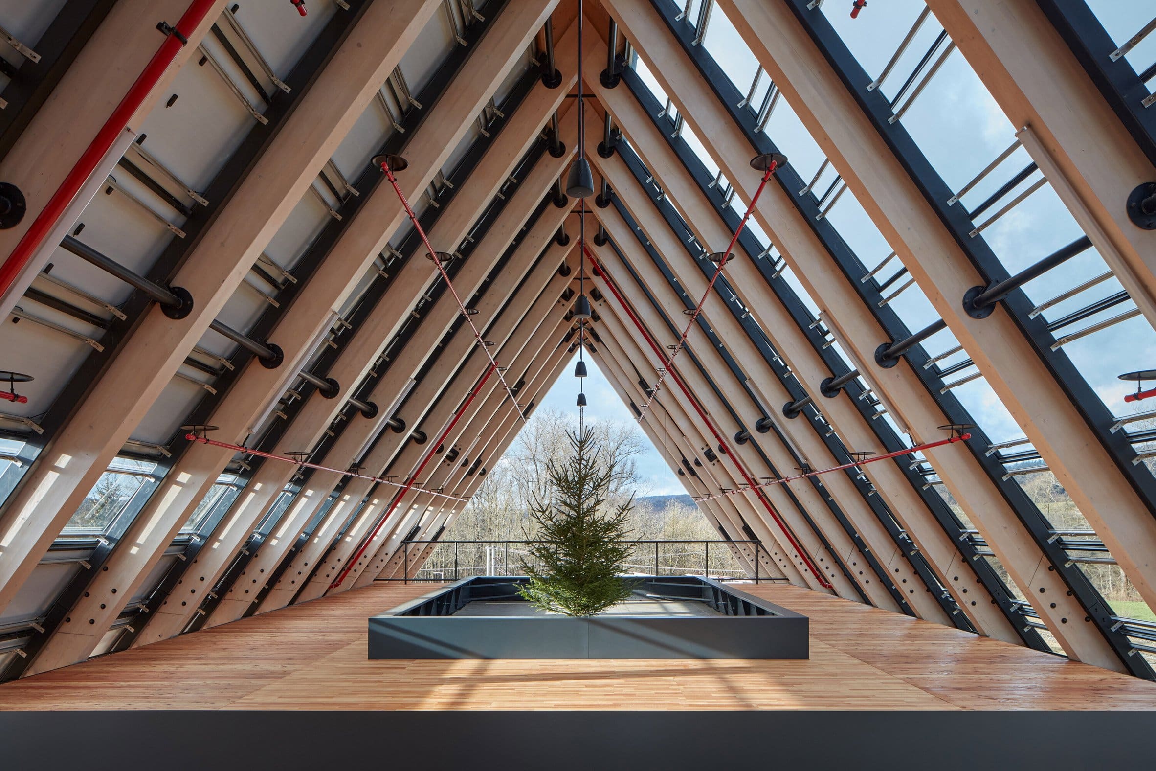 Room underneath gabled roof of Kloboucká lesní HQ