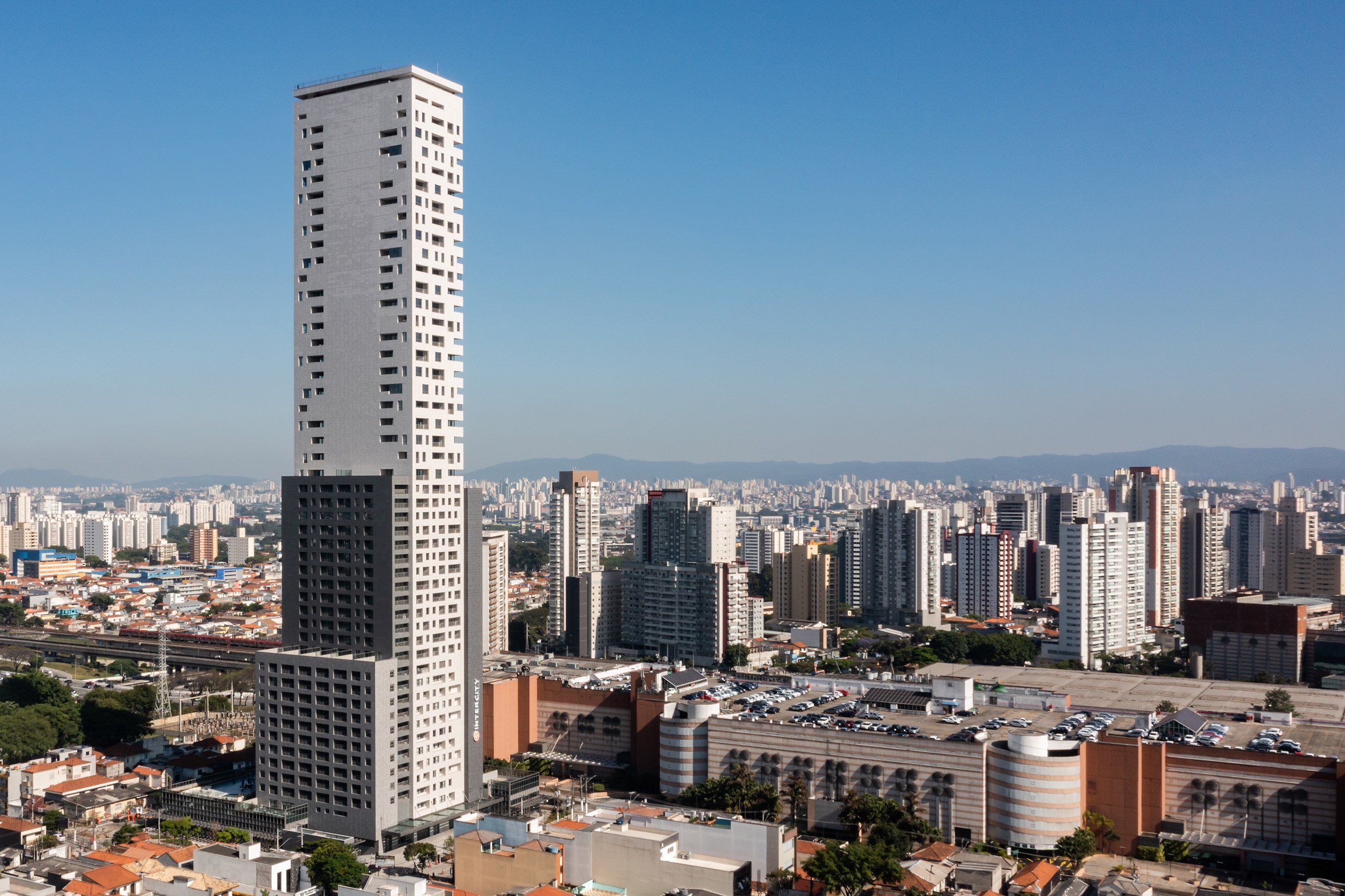 skyscraper with city in the background