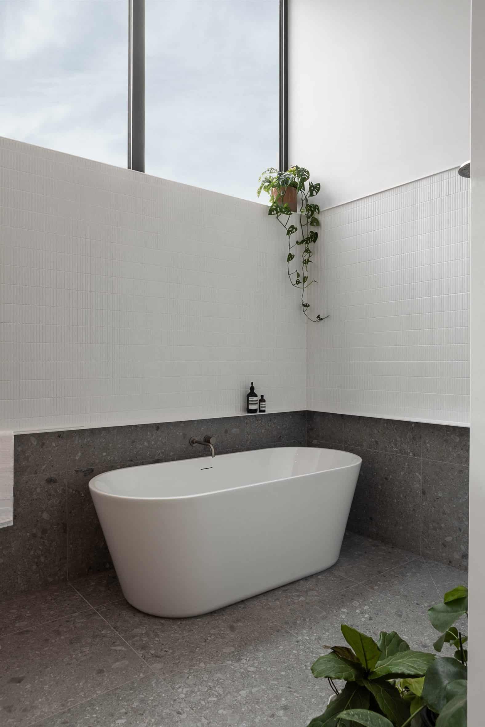Sunlit bathroom within home by Ménard Dworkind