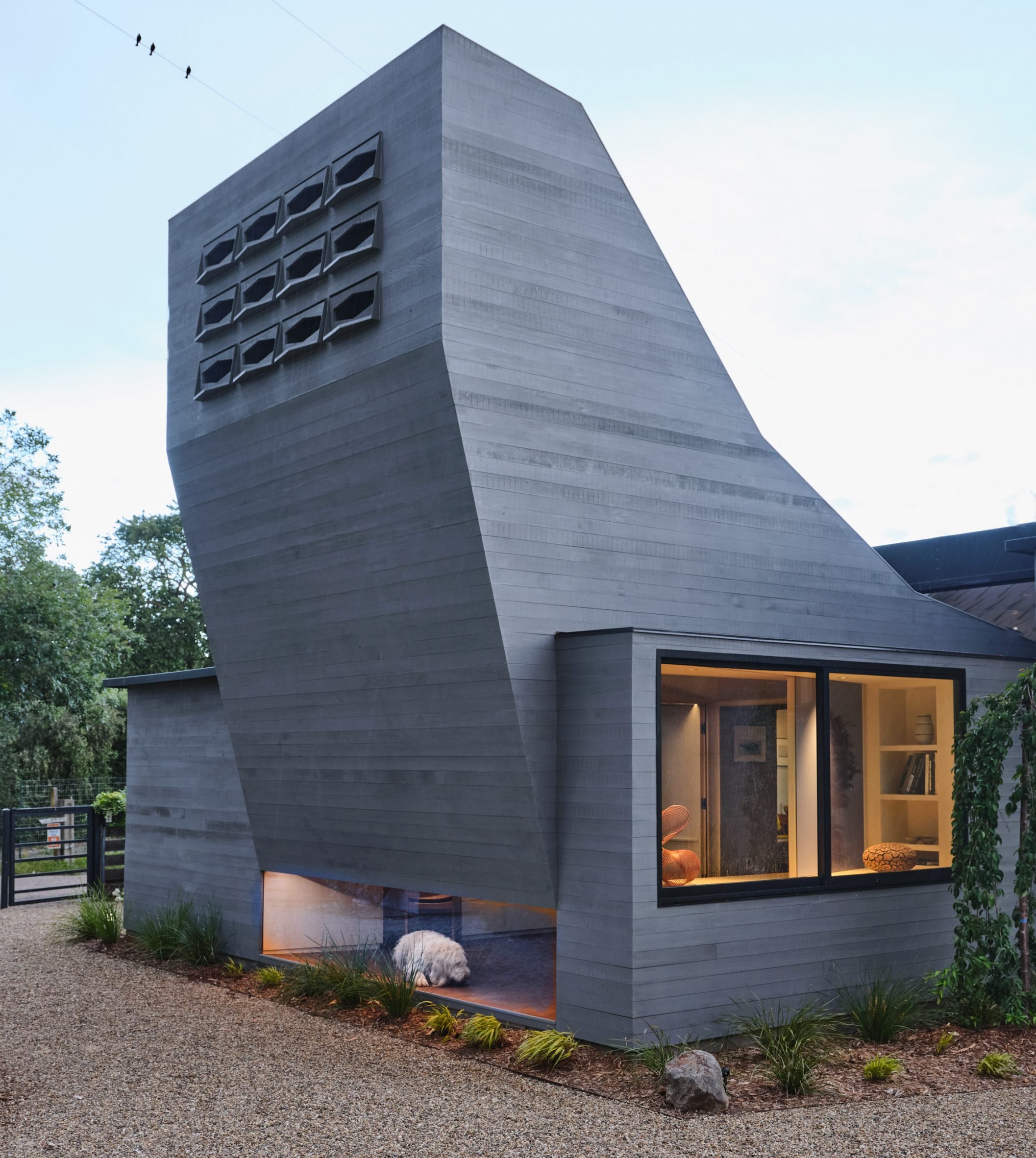 Rectilinear bird-watching window built into facade of Sonoma house extension