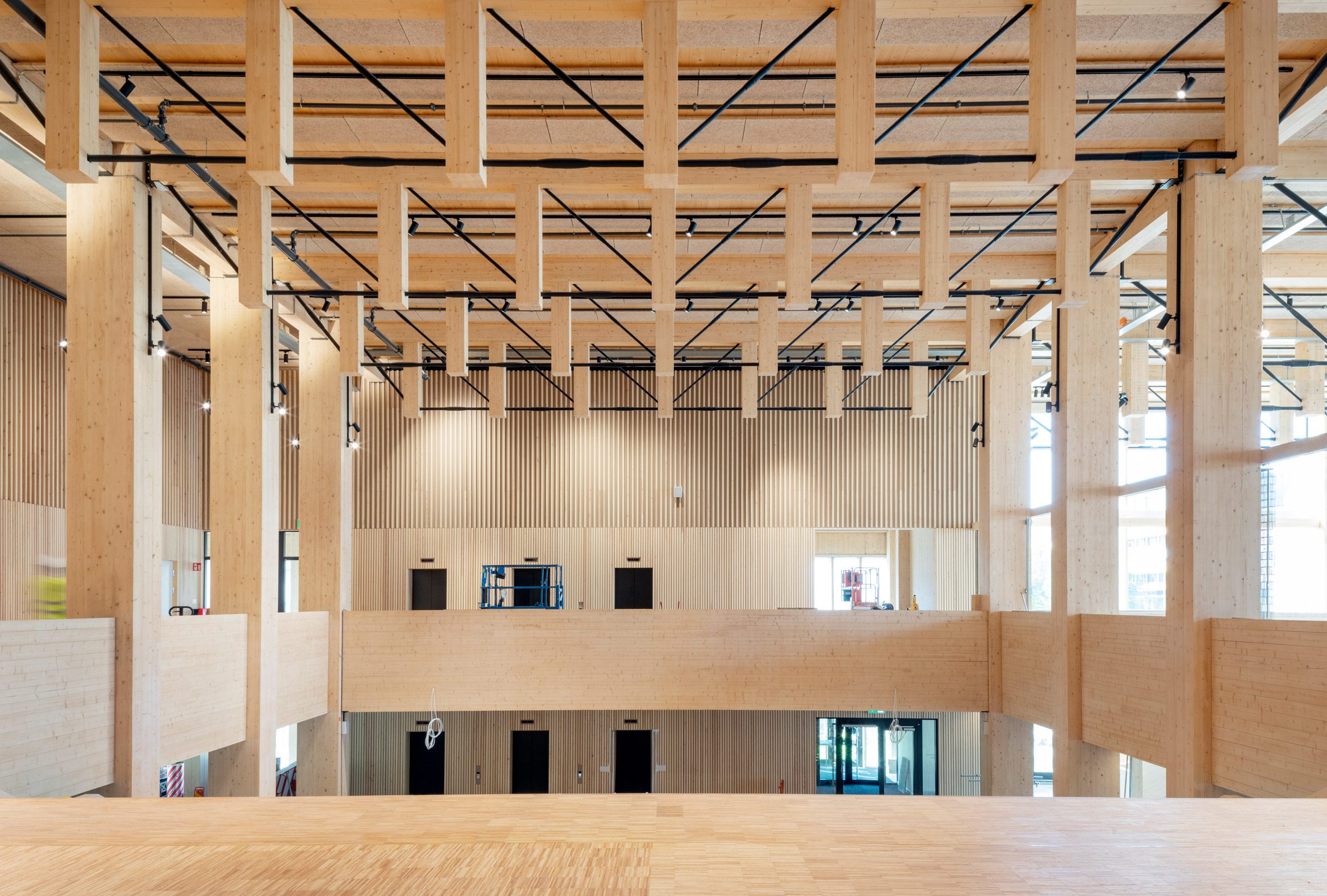 Wood-lined foyer by White Arkitekter