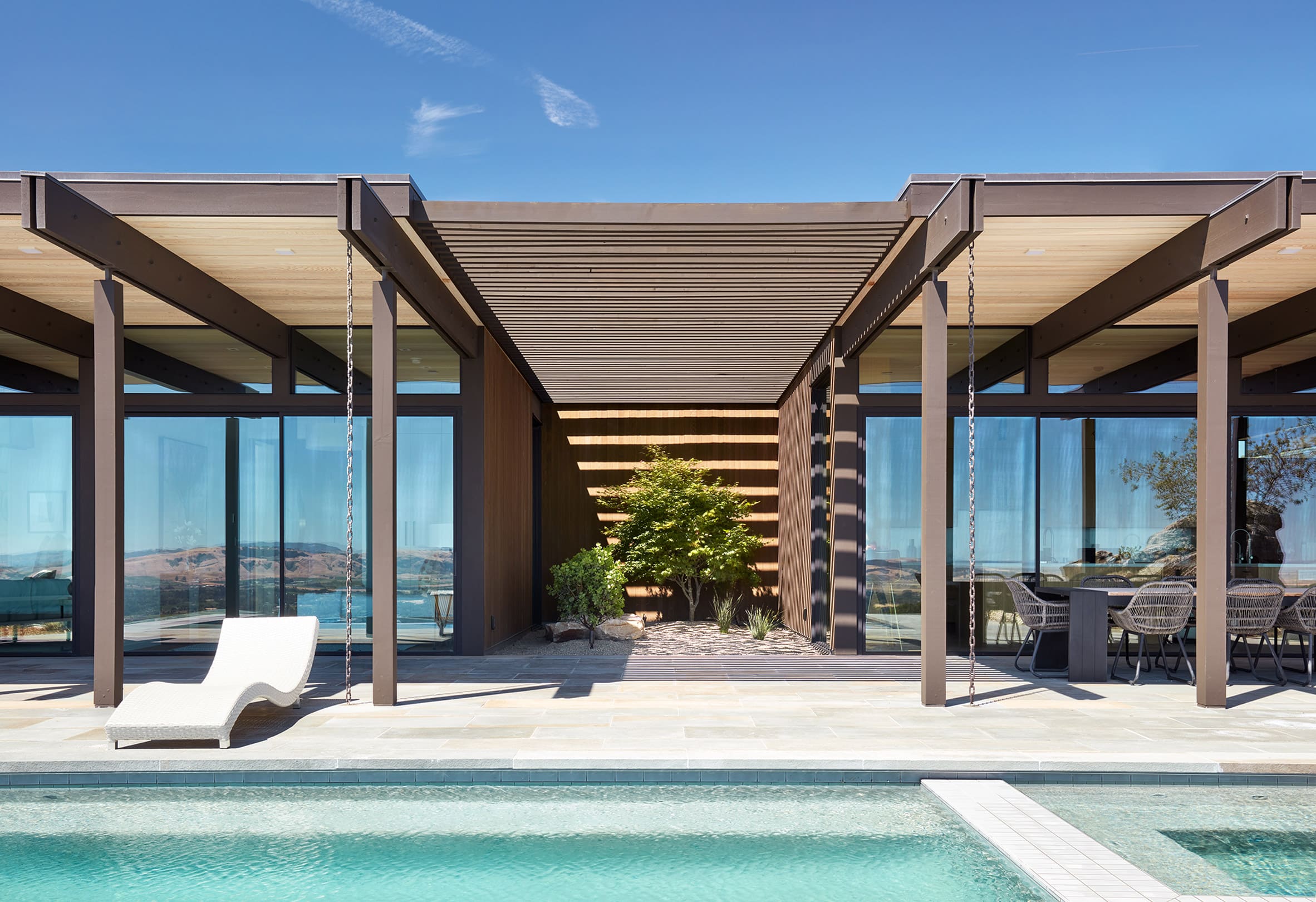 Long swimming pool at rectilinear house in California