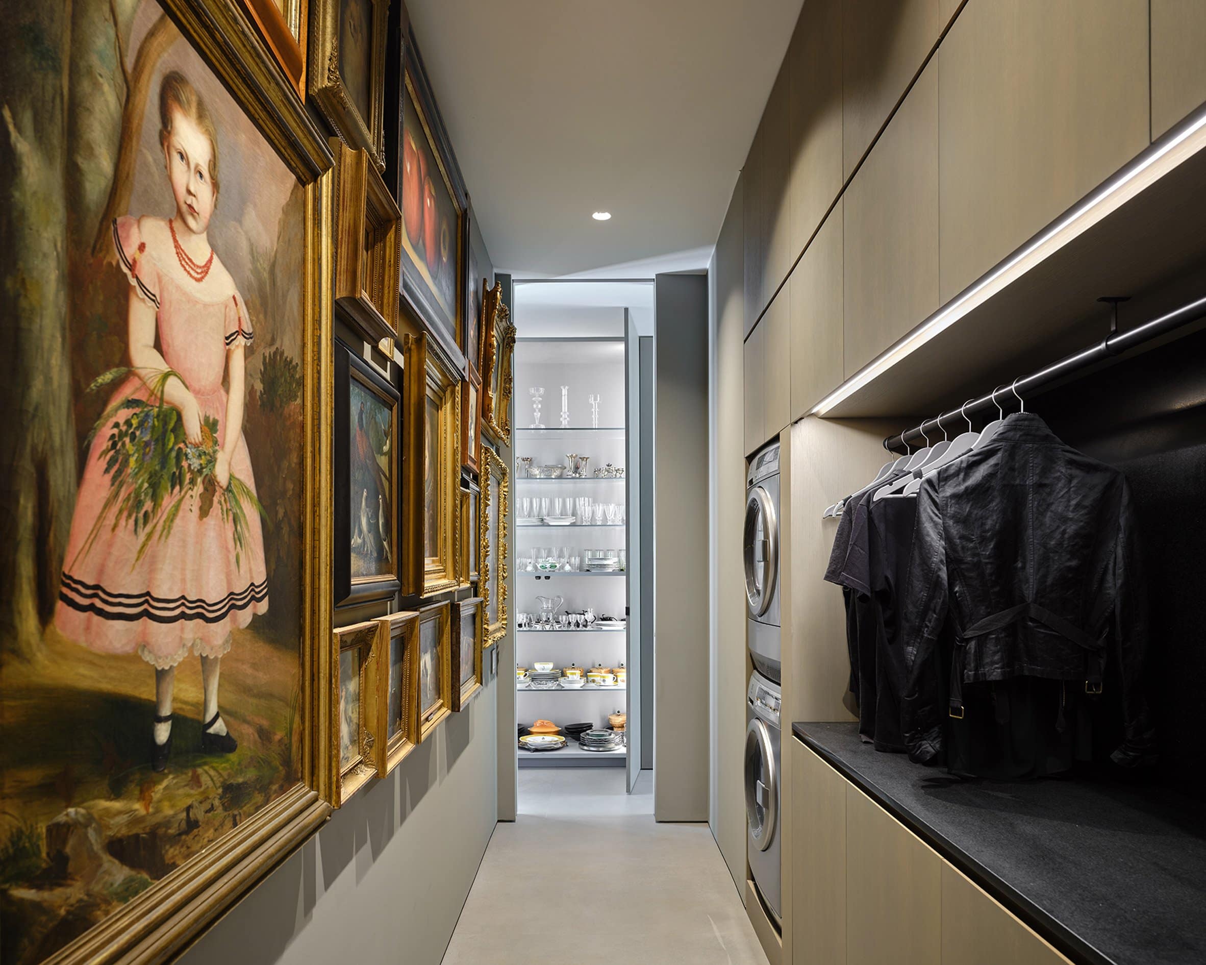 Laundry room-cum-art-gallery within glass house by Specht Architects