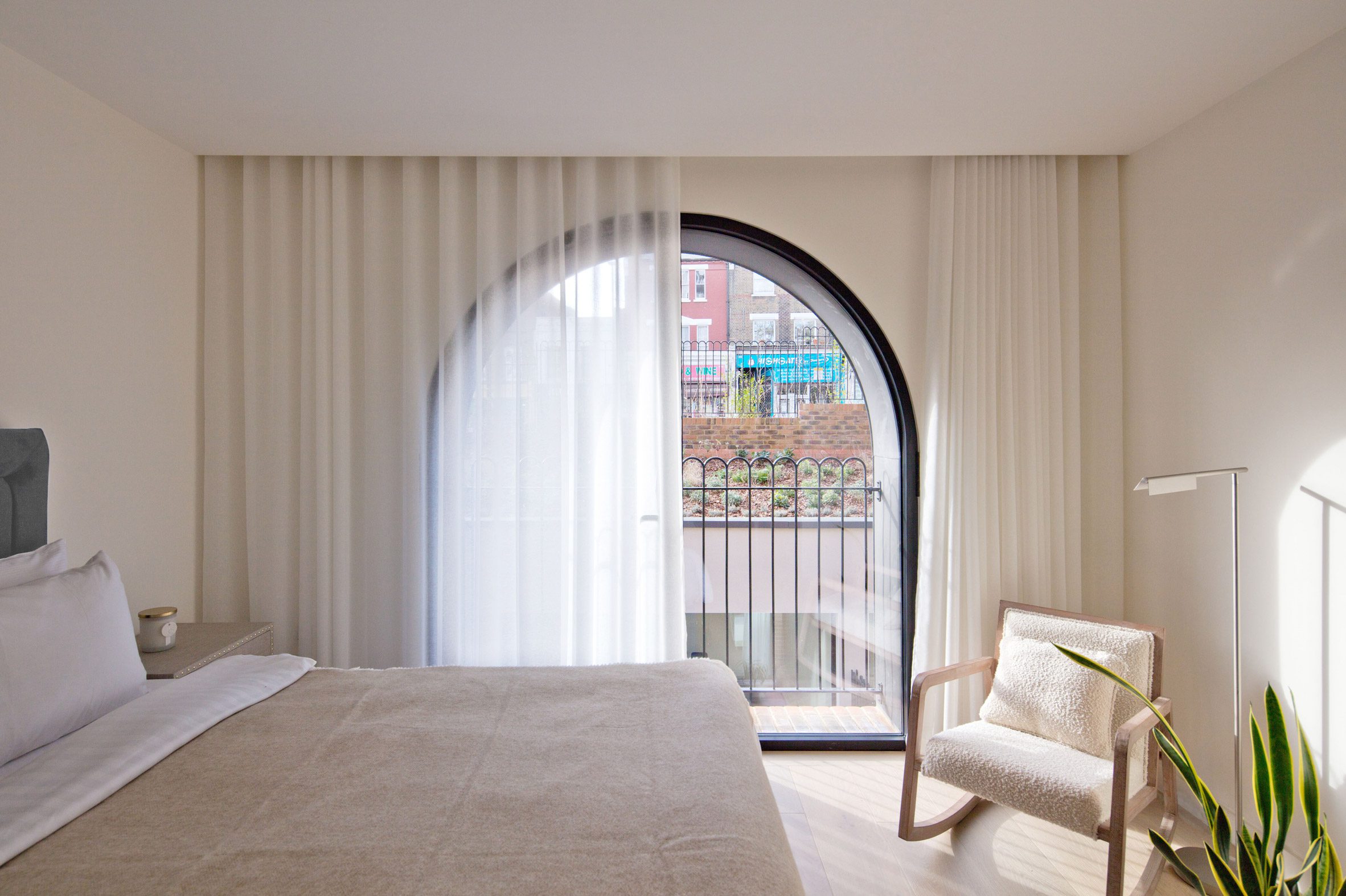 Bedroom of London townhouse by The DHaus Company