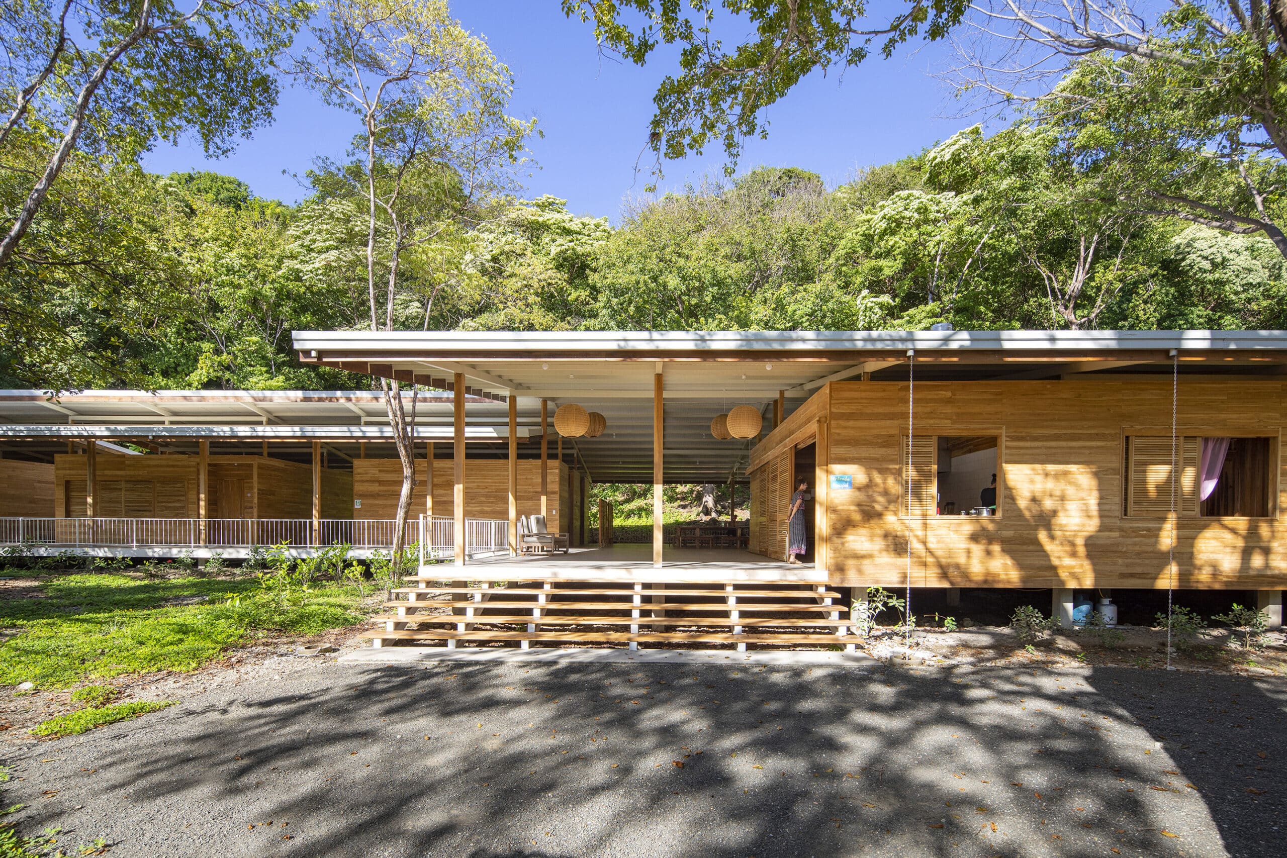 An exterior shot of Waldorf School Casa de las Estrellas, showcasing its beautiful wooden facade, which highlights the school's natural and harmonious ethos.