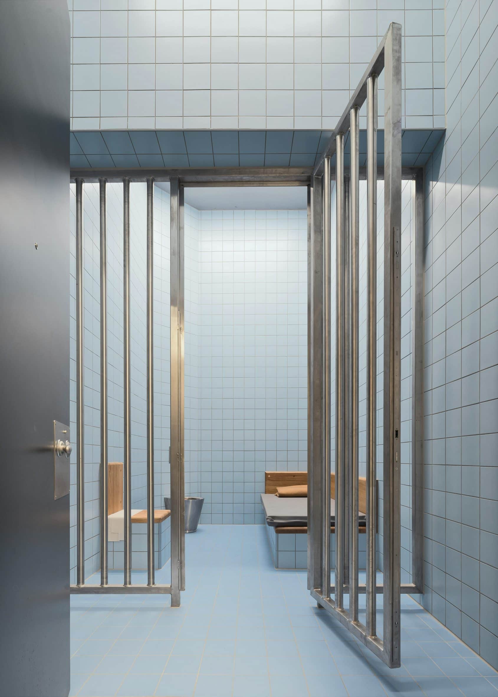 Pale blue tiles in police cell