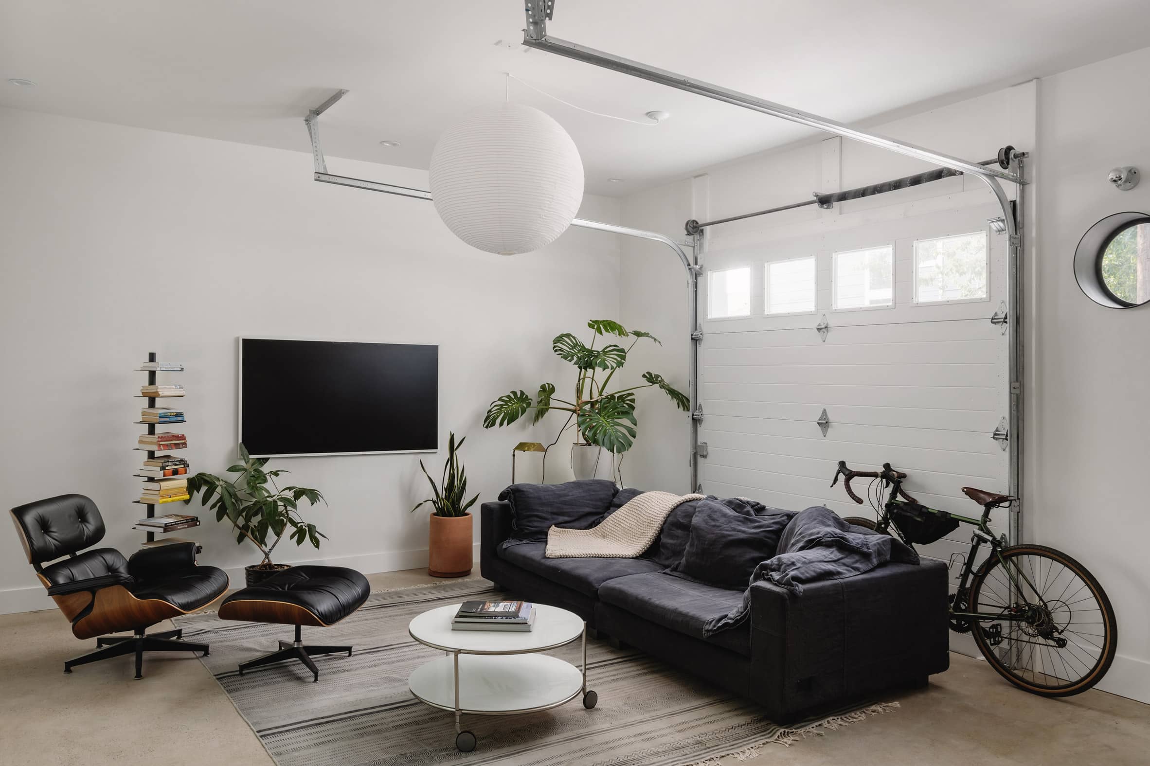 White walls of ADU with roll-up garage door