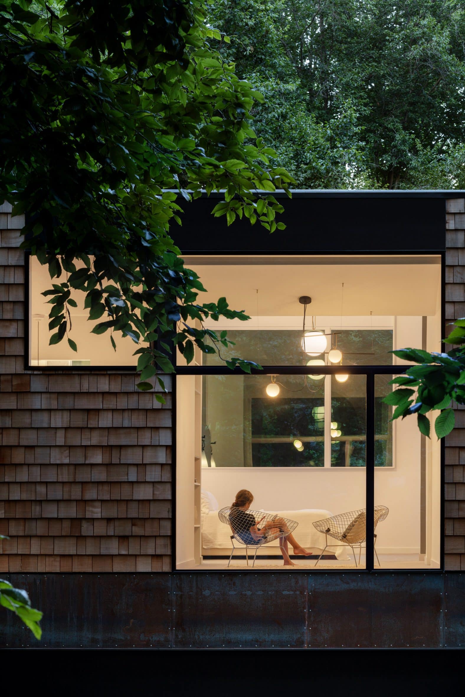 Window with young girl reading