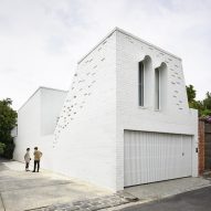 Brick surrounds the exterior of the building