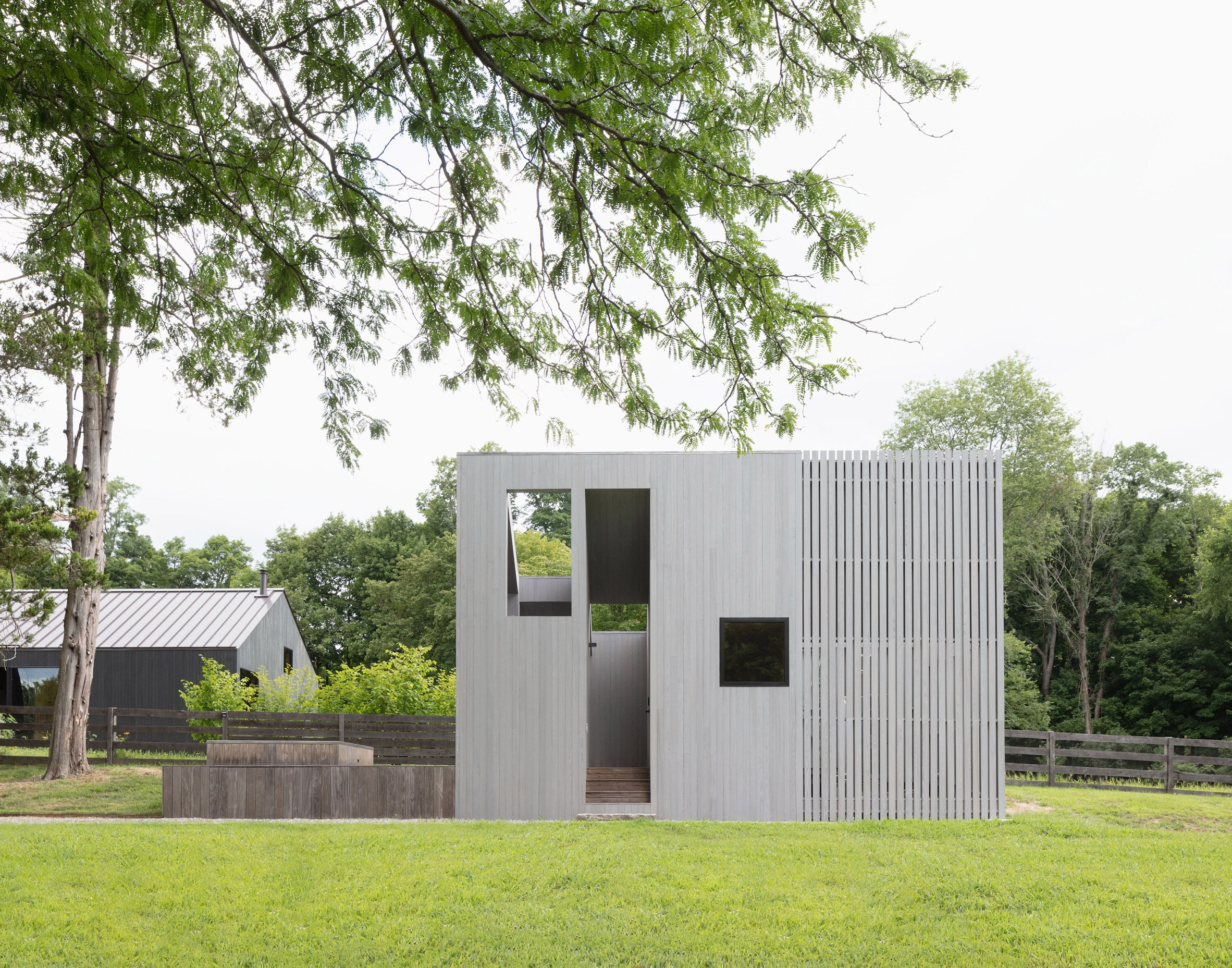 Timber-clad outbuilding by Worrell Yeung