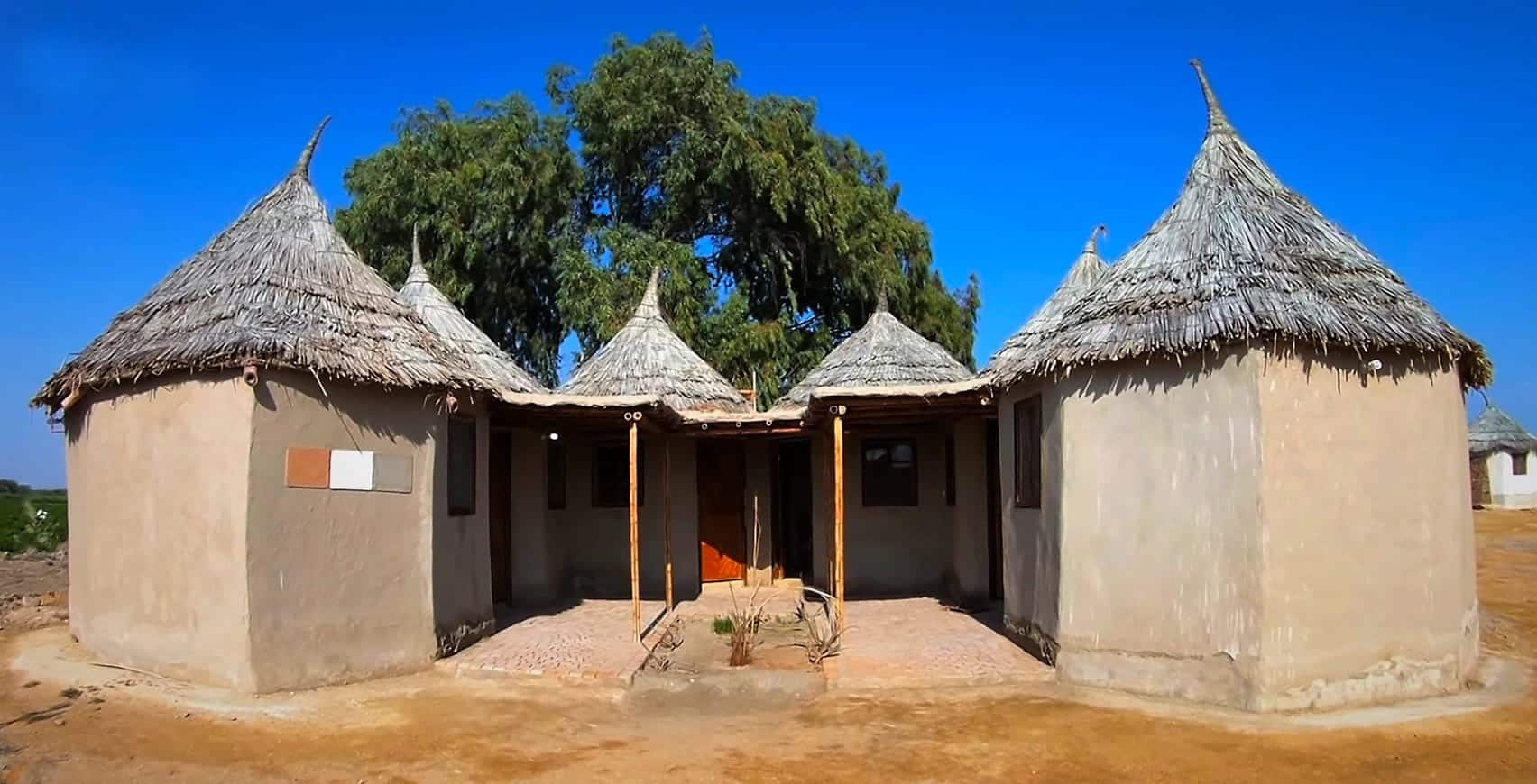 Mud, lime and bamboo Lari Octa Green cottages in Makli