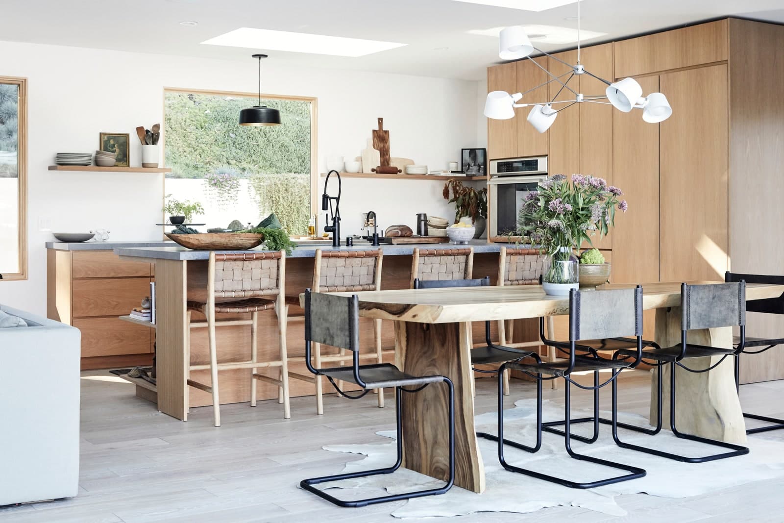 Image may contain Indoors Room Furniture Table Dining Table Kitchen Island Dining Room and Kitchen