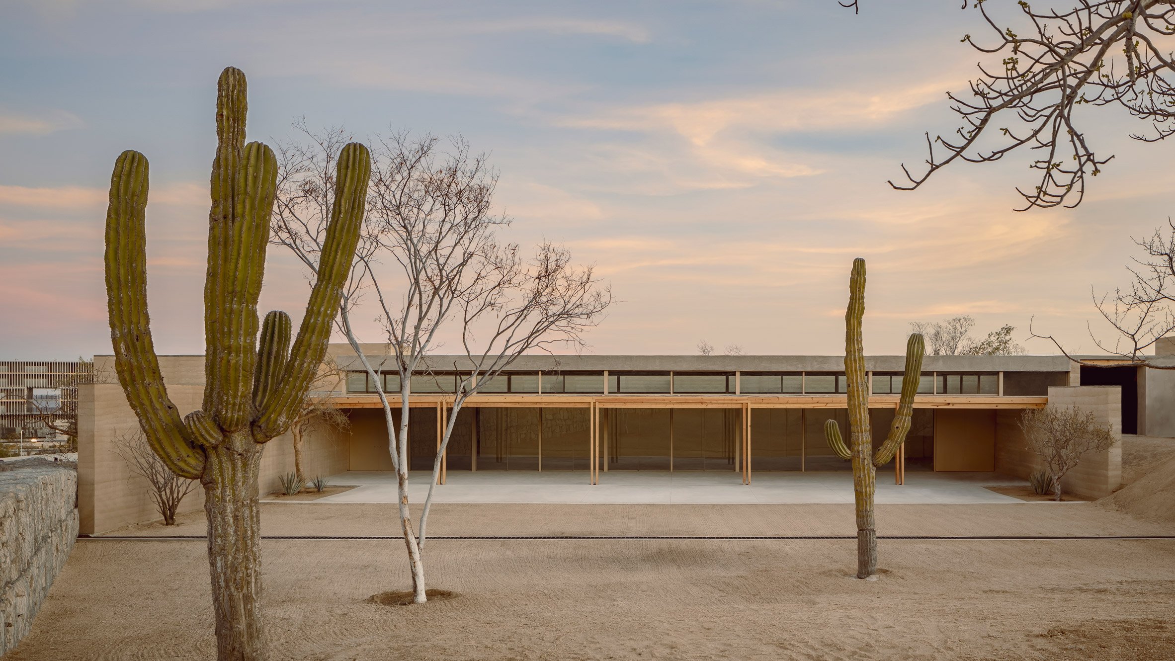 Boxy rammed earth buildings at Mexican sports complex