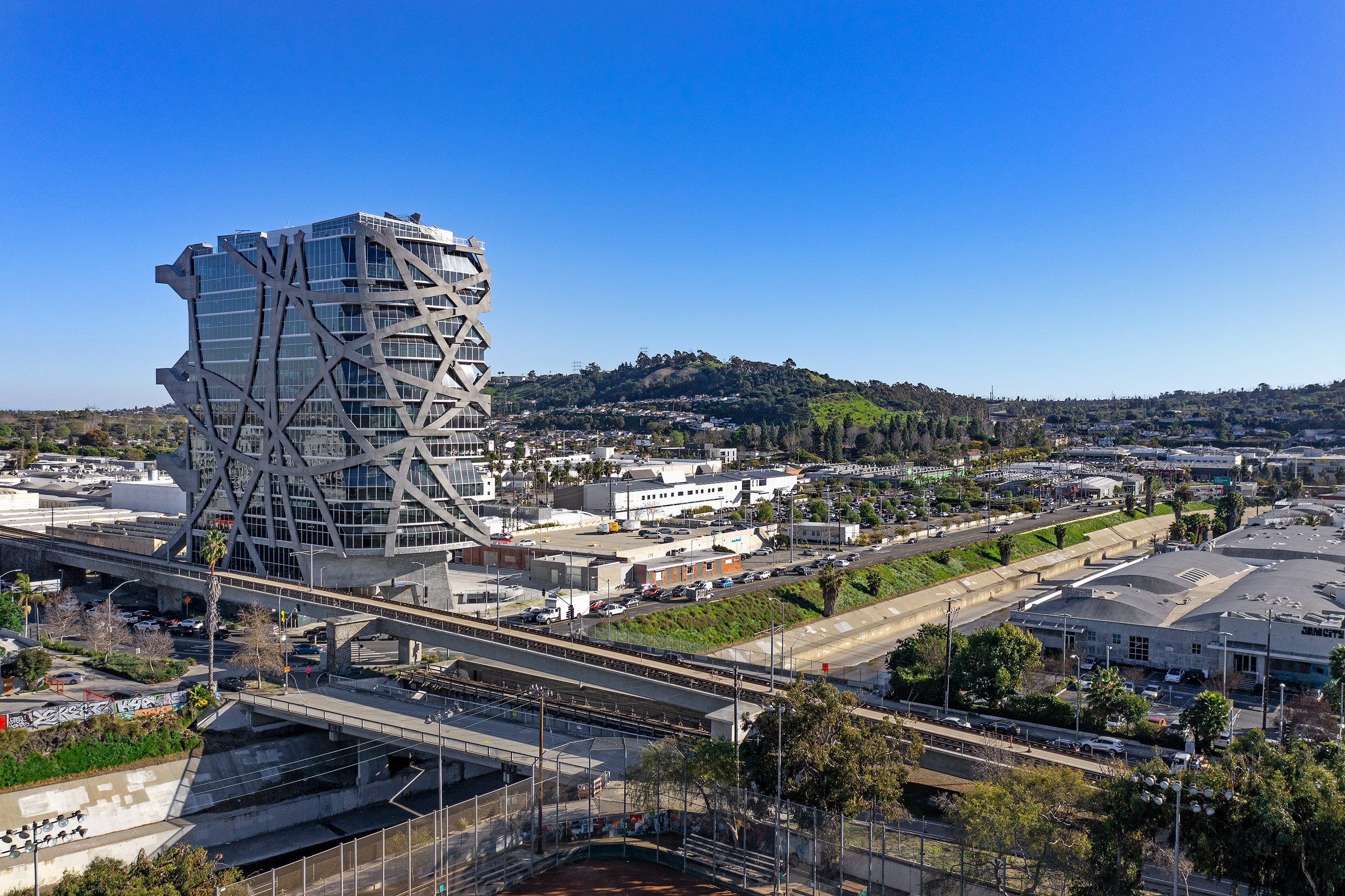Wrapper tower with train and LA hill in the background