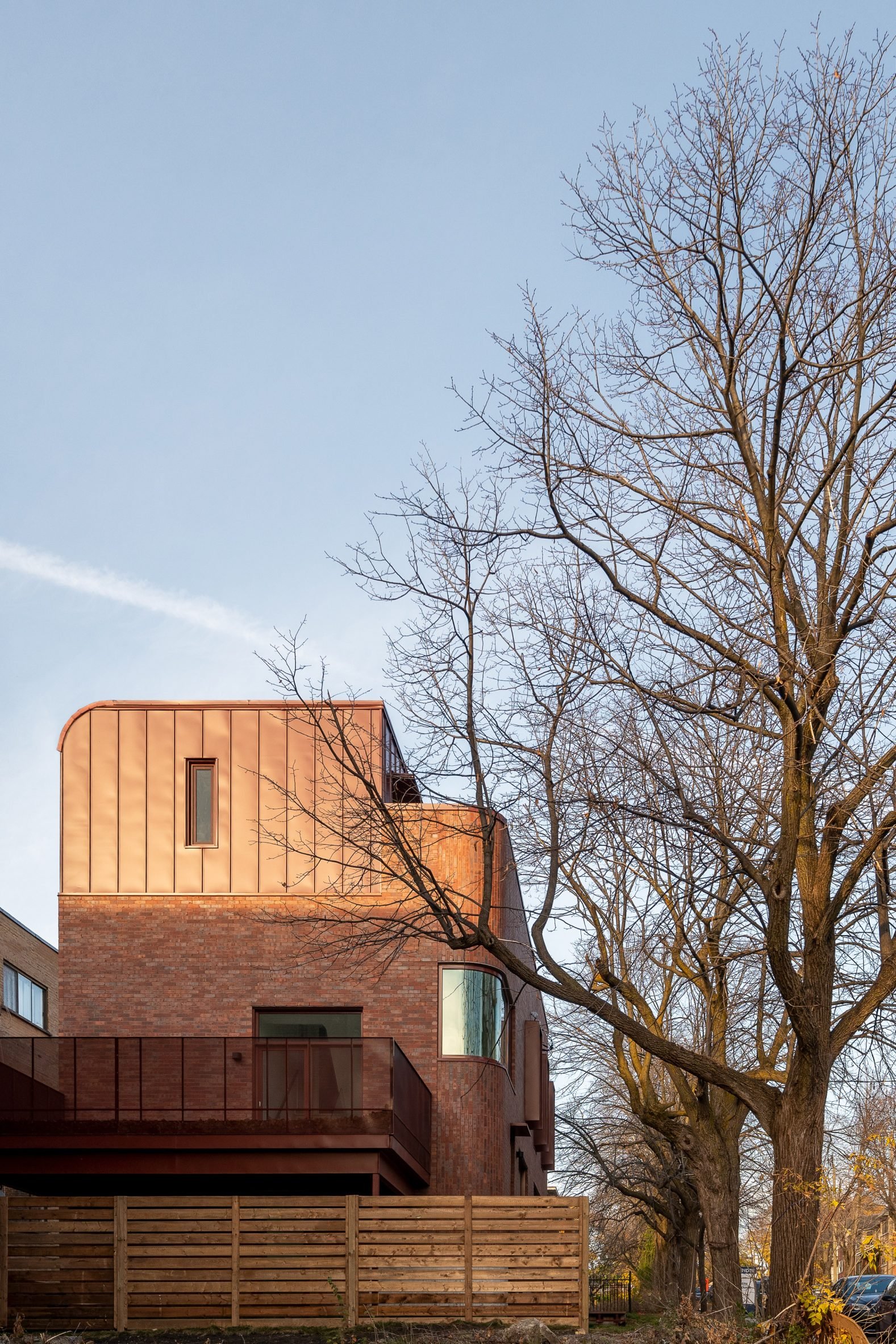 Sunlight on top of red brick building in Montreal