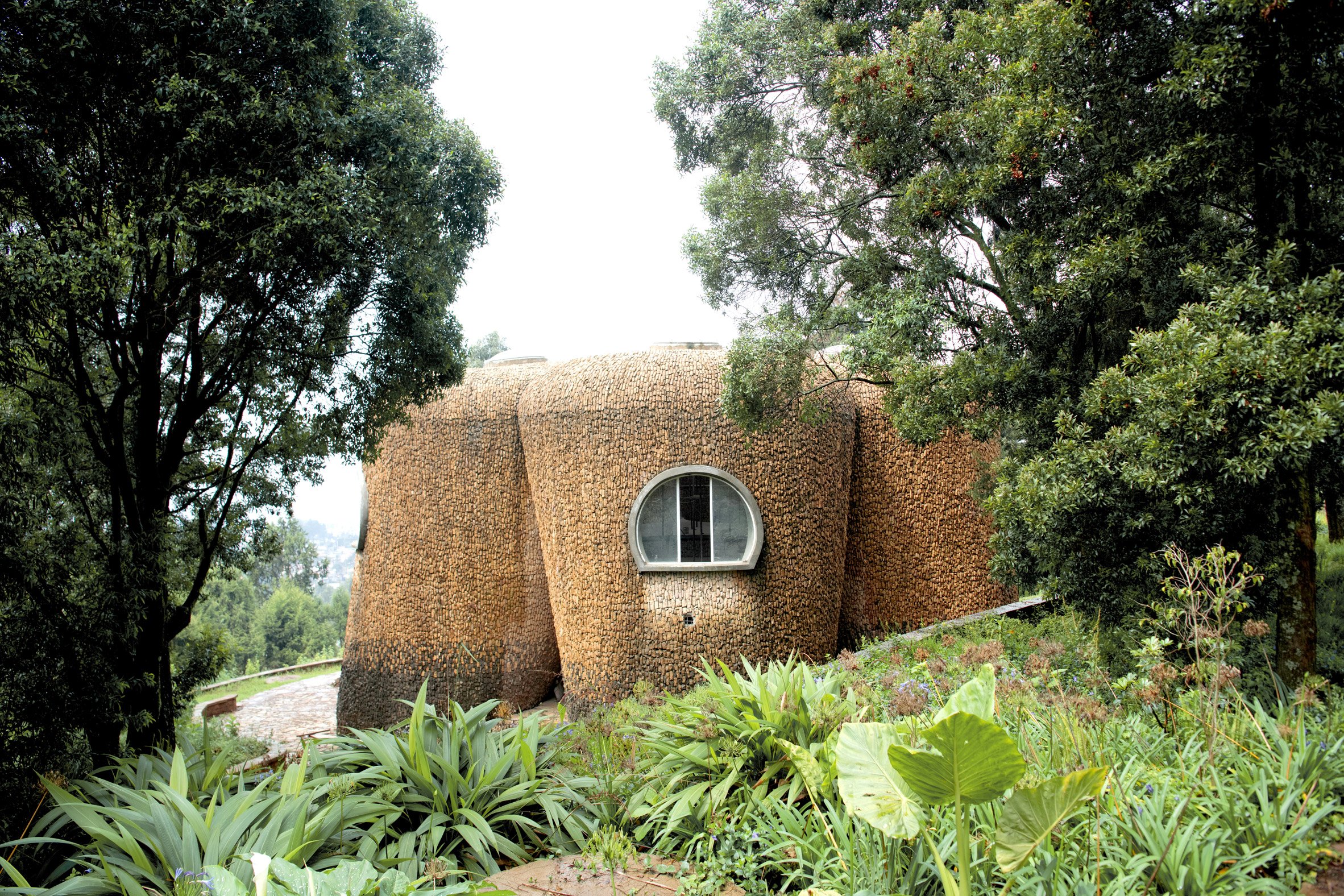 Stone research centre on a hillside at the Meles Zenawi Memorial Park by Studio Other Spaces