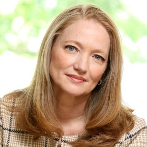 Claire Rutkowski Headshot - Tan Blaze