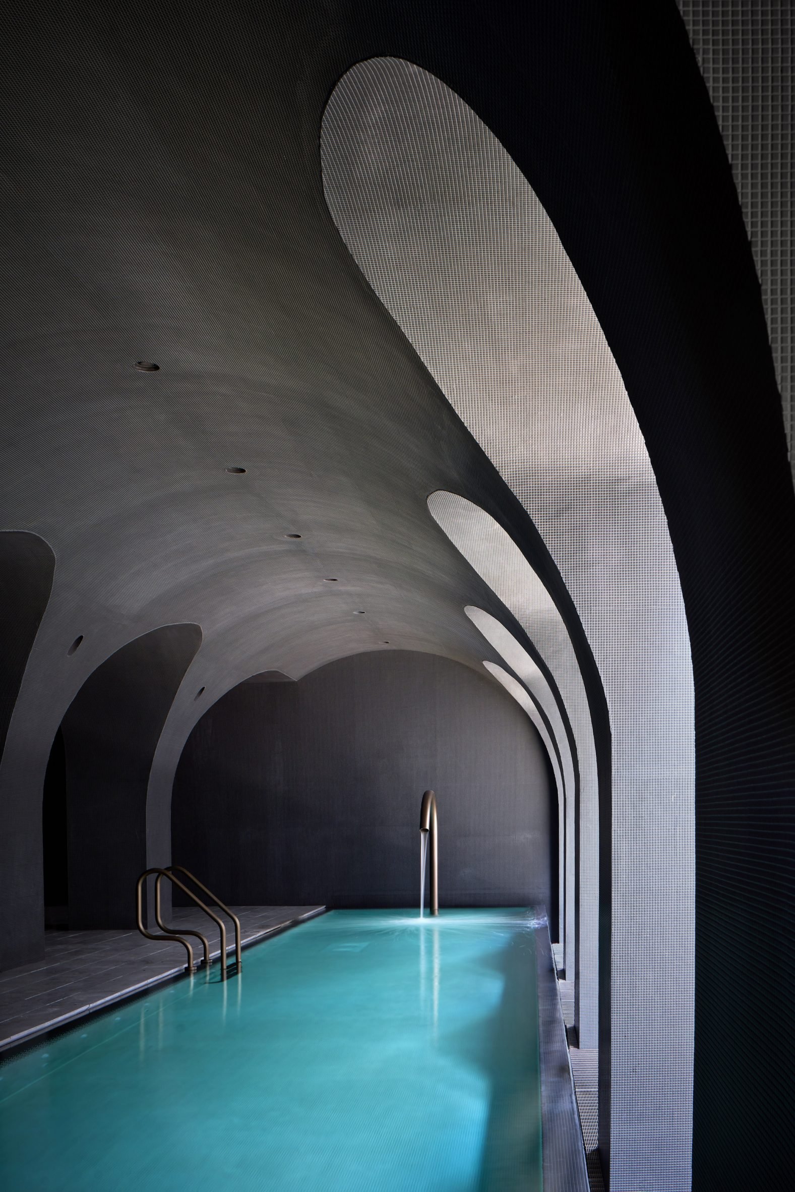 Arched pool in skyscraper spa