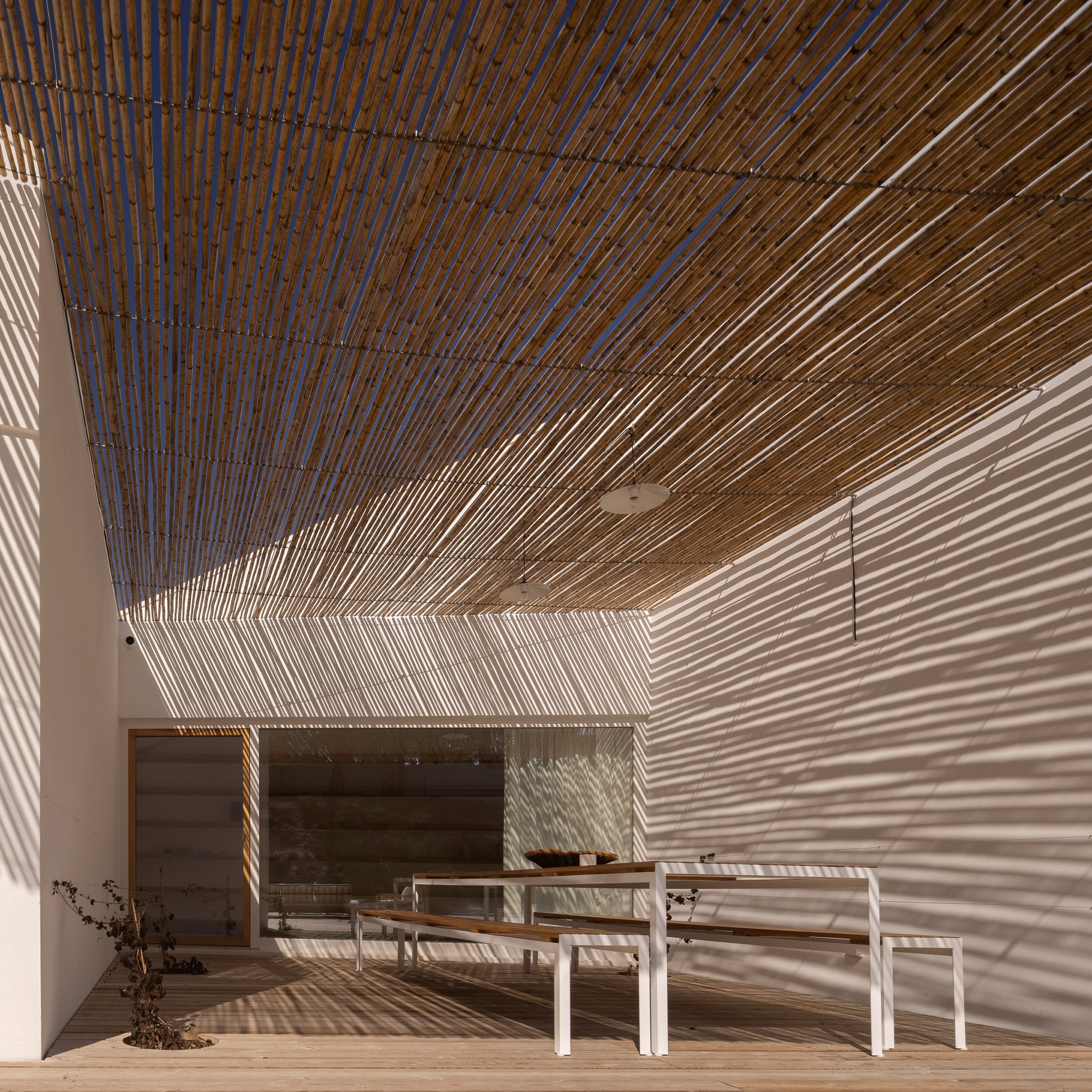 Courtyard living space at Pura Comporta vacation villa by Falcão de Campos