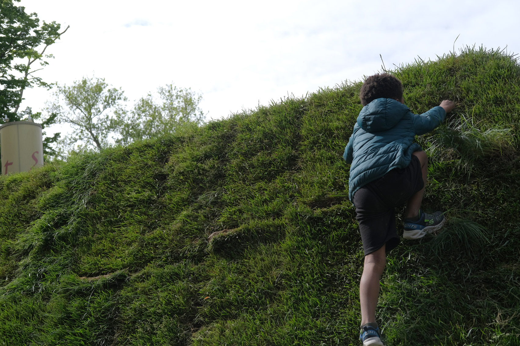 Child climbing Ukraine Pavilion at Venice Architecture Biennale