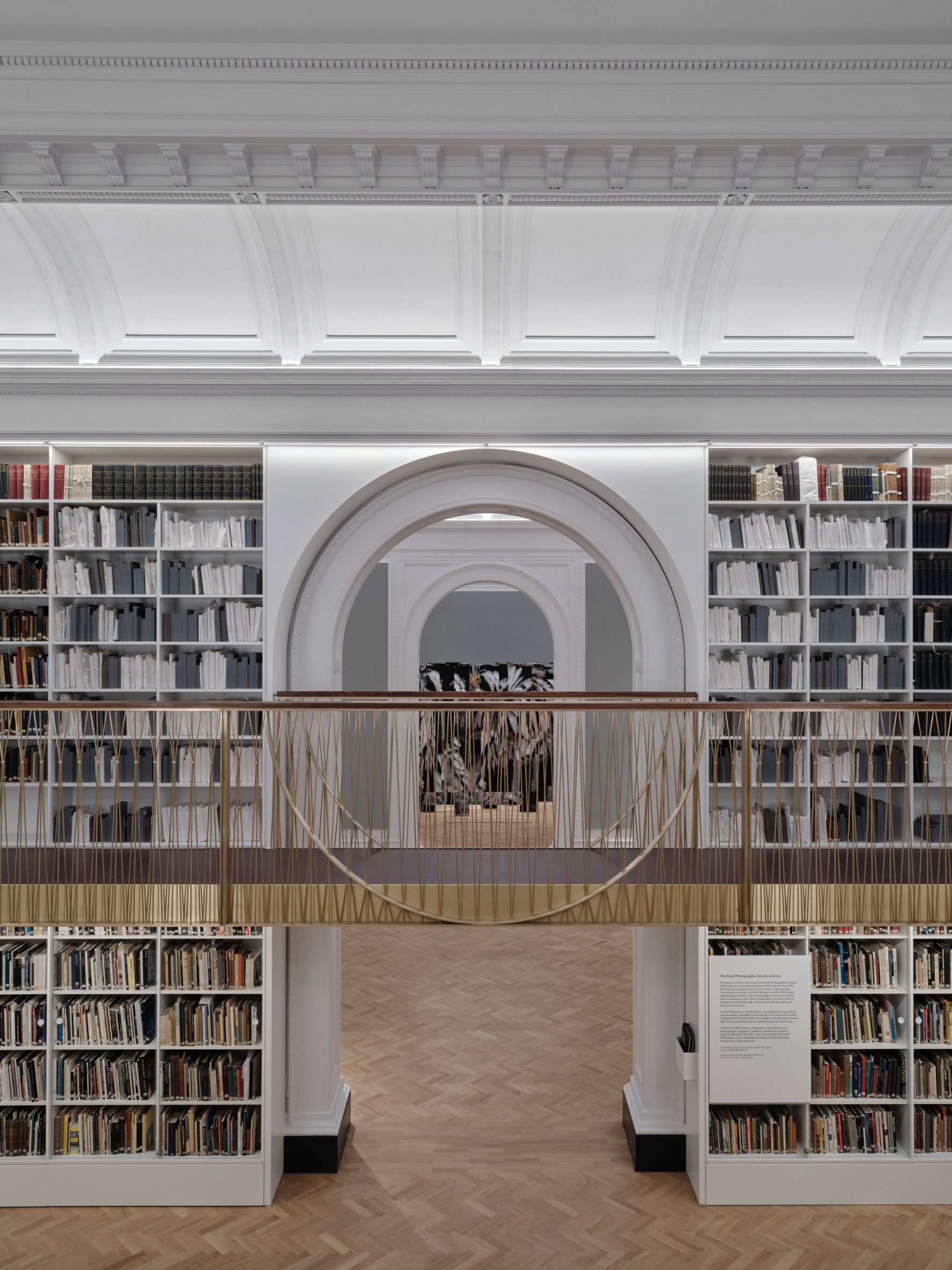 Shelves of double-height library