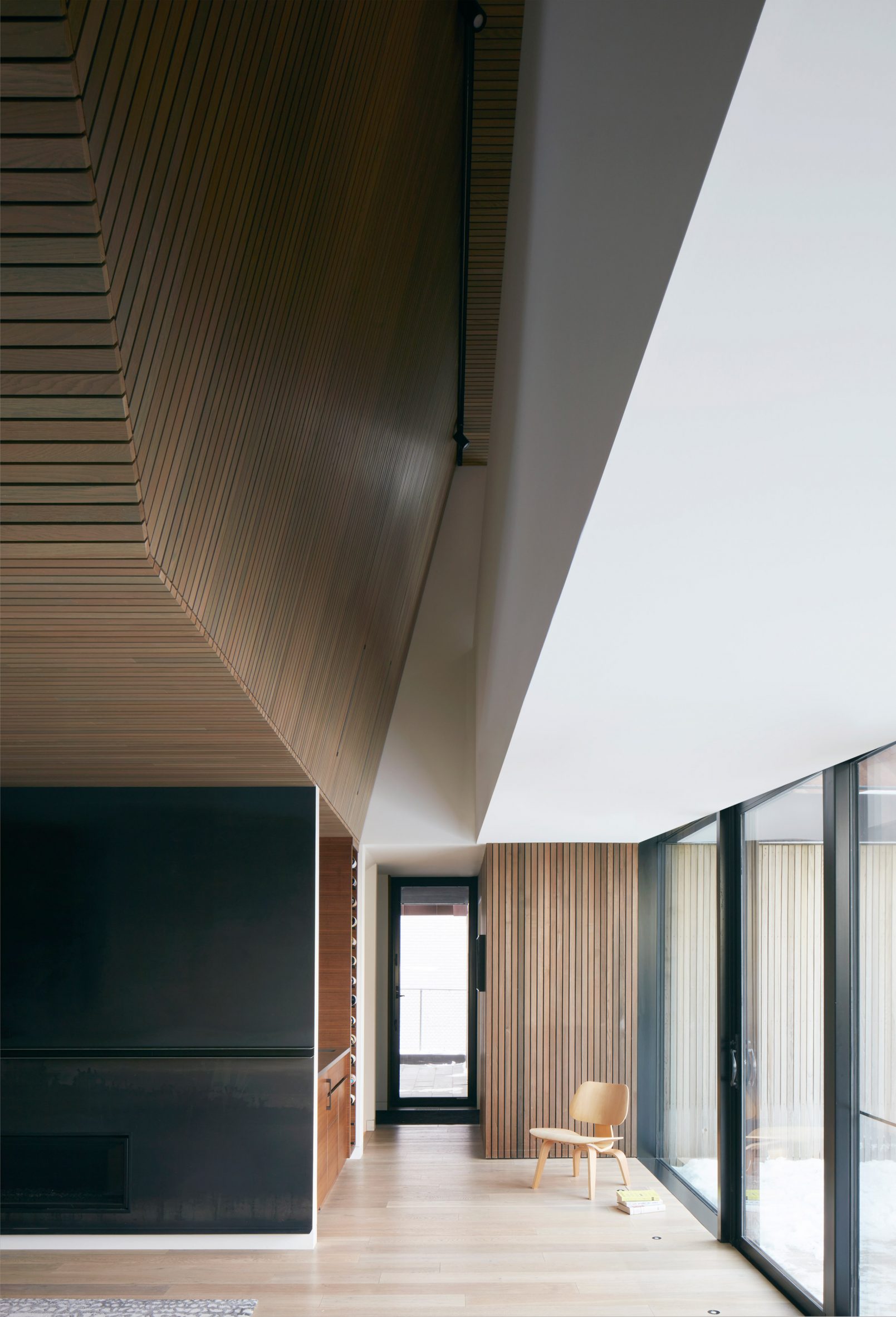 Open concept living room with cedar panelling