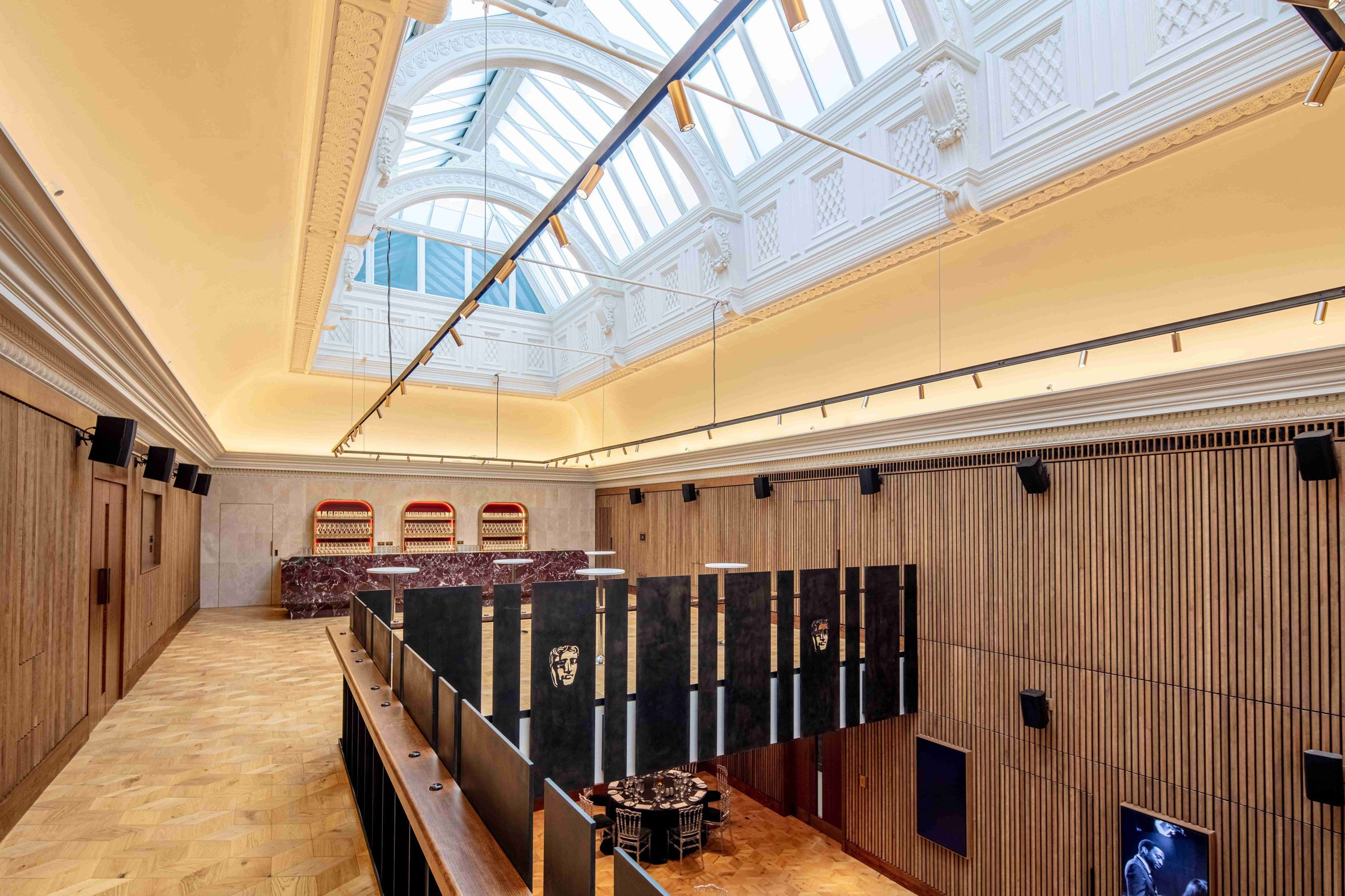 Double-height space inside refurbished BAFTA headquarters by Benedetti Architects