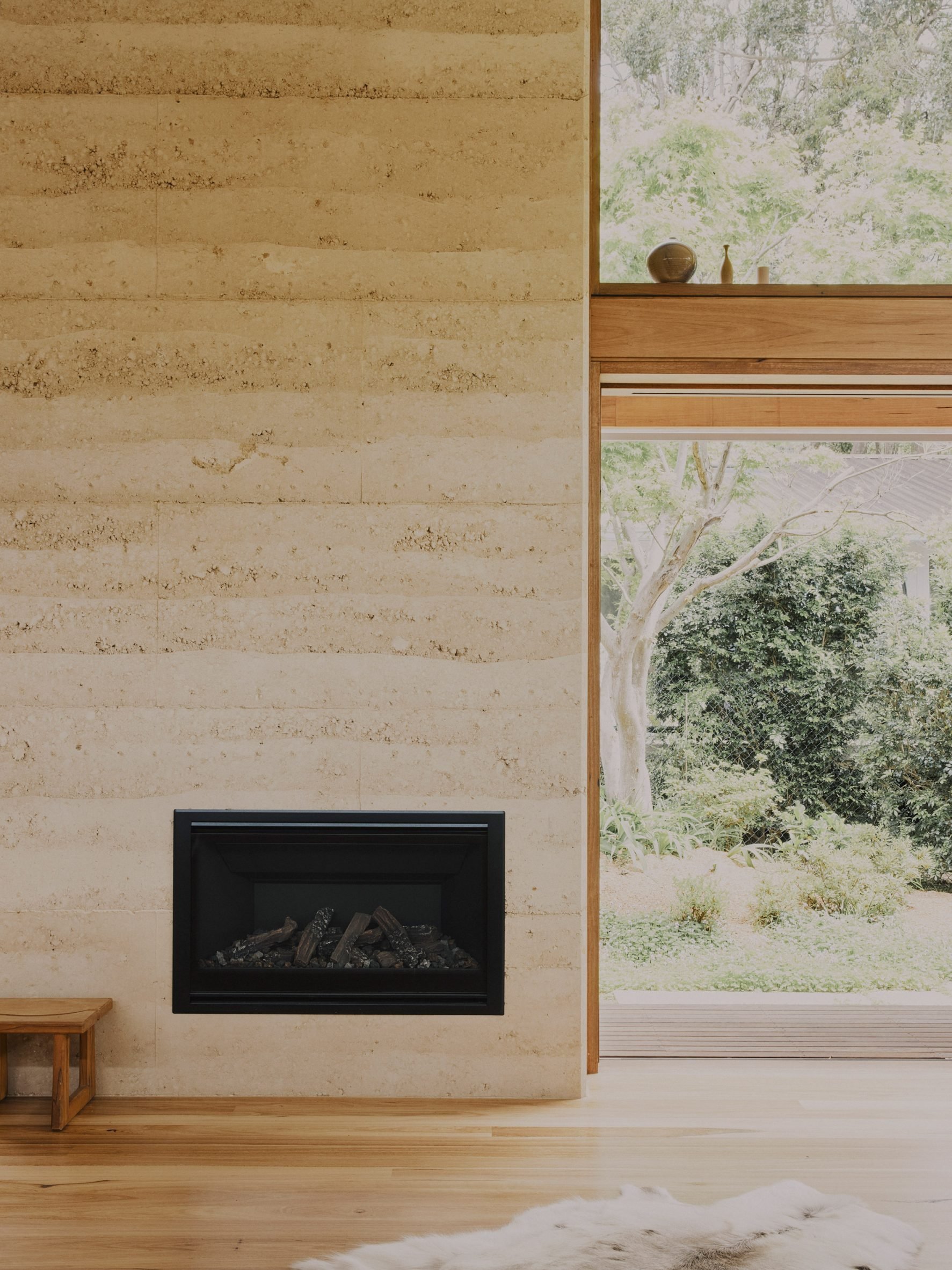 Rammed-earth chimney breast