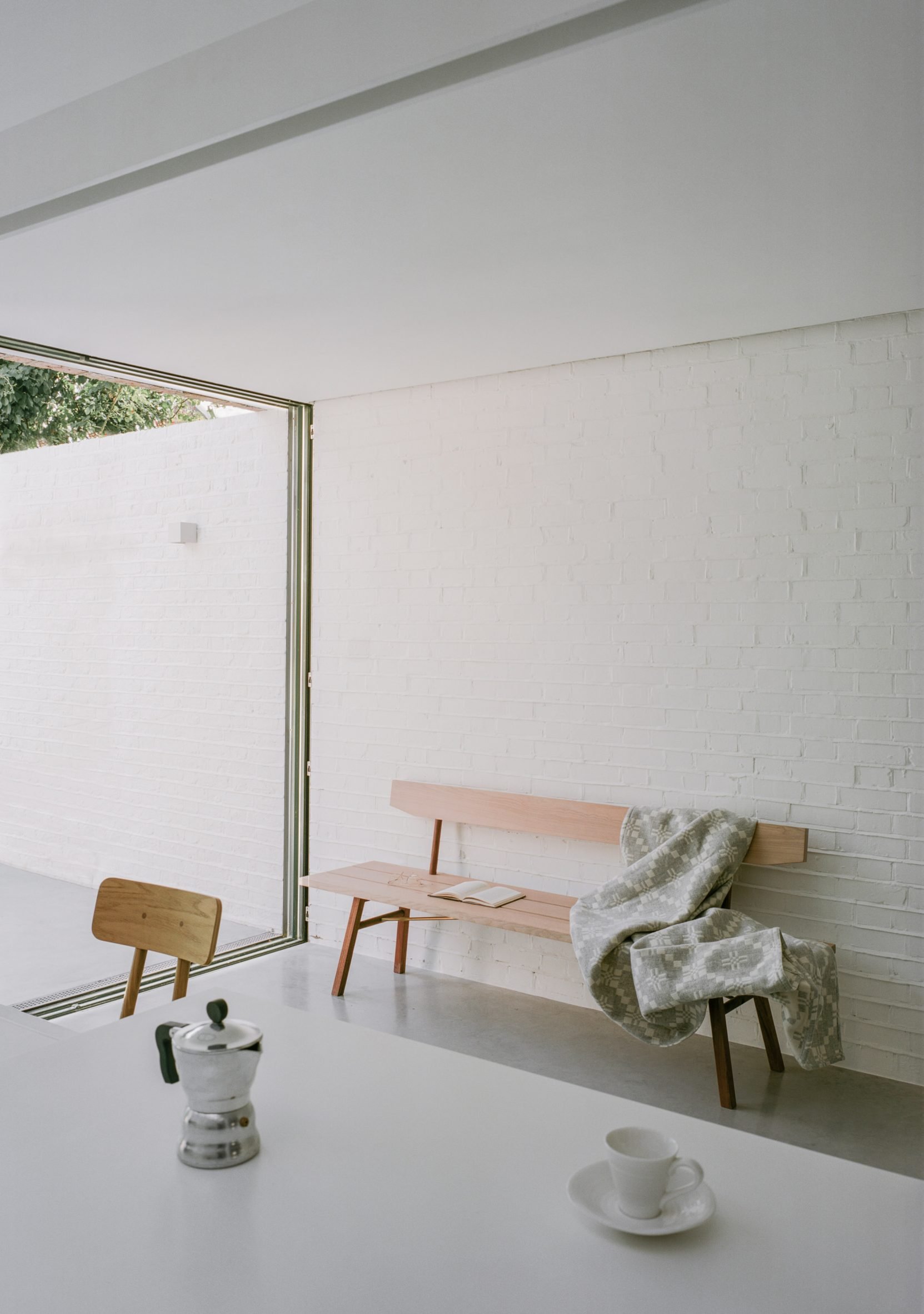Extension with white brick walls