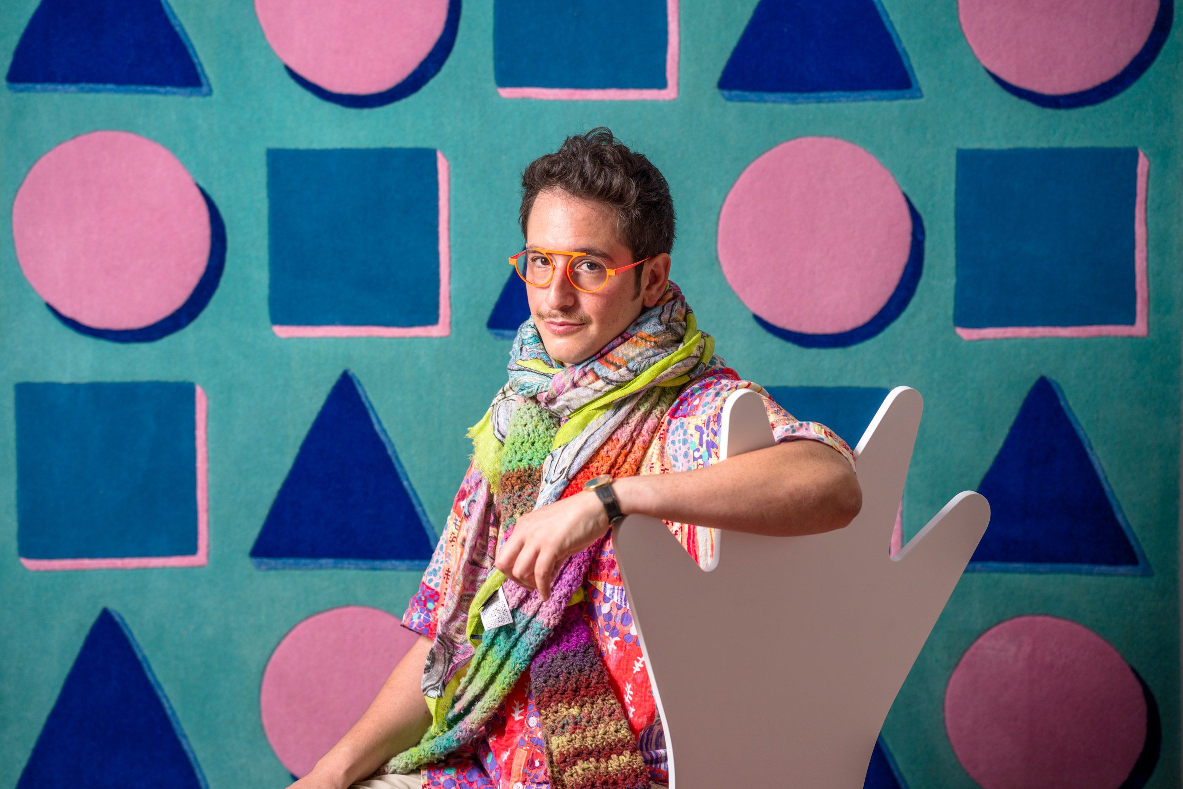 Adam Nathaniel Furman wearing orange glasses