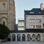 Exterior a cathedral and school with glass extension by Charles F Bloszies