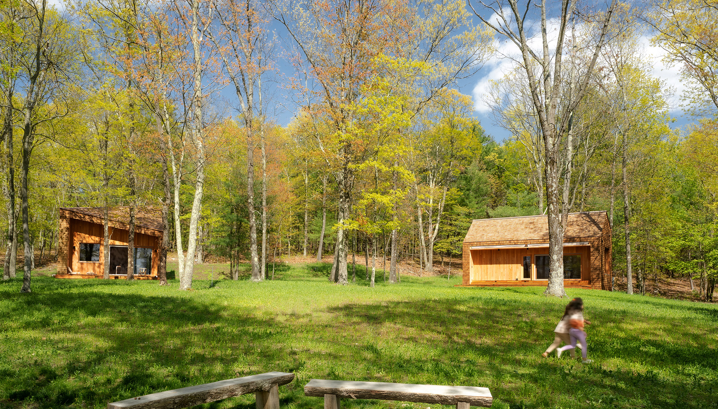 Two cabins in woods
