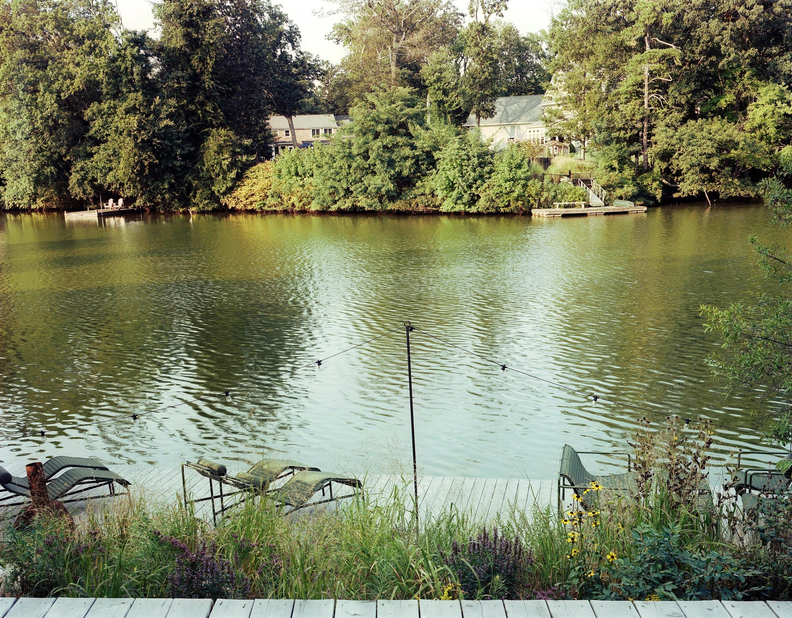 Refugia Design created the slanted decks in addition to the verdant landscaping.