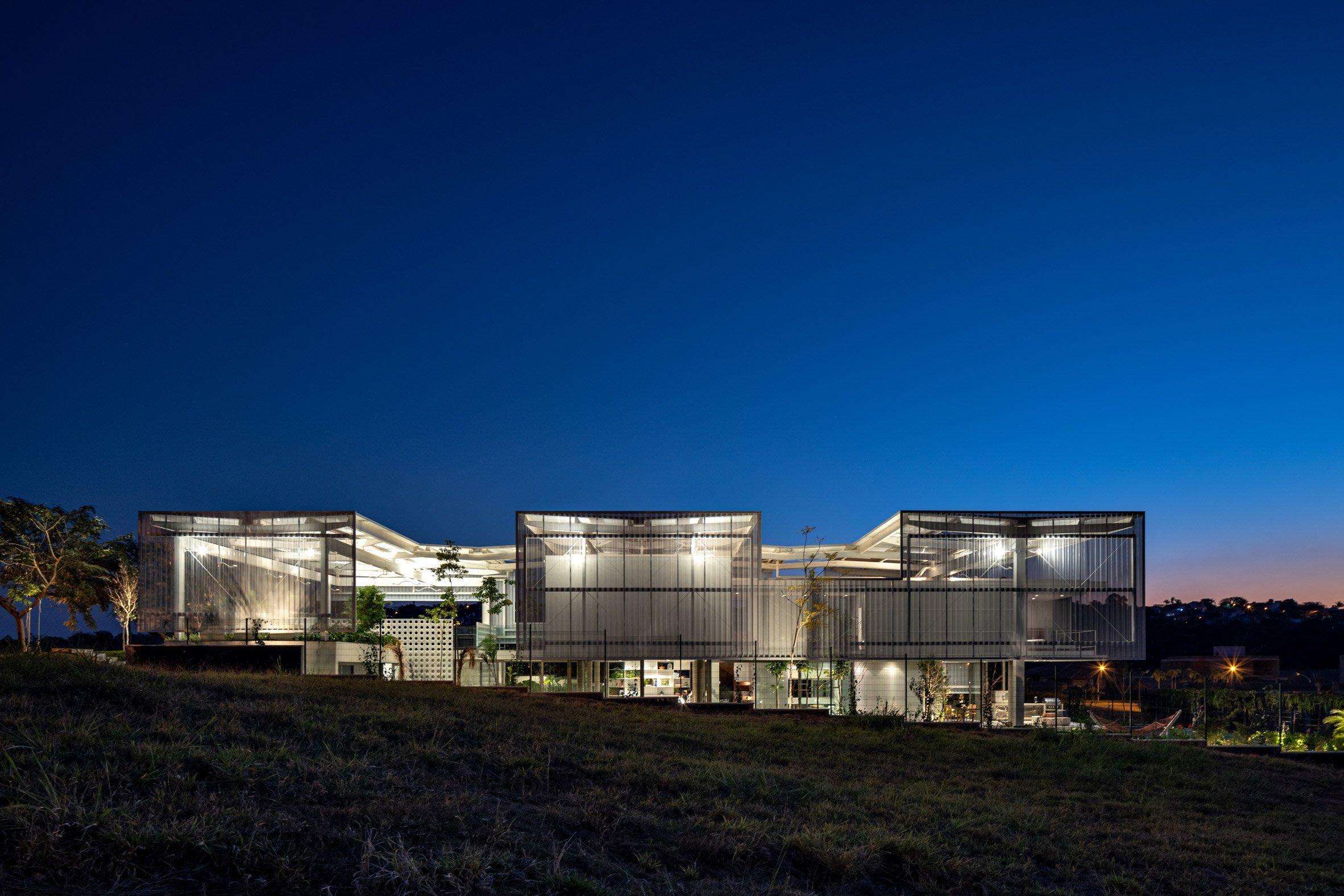 A contemporary, angular structure at night