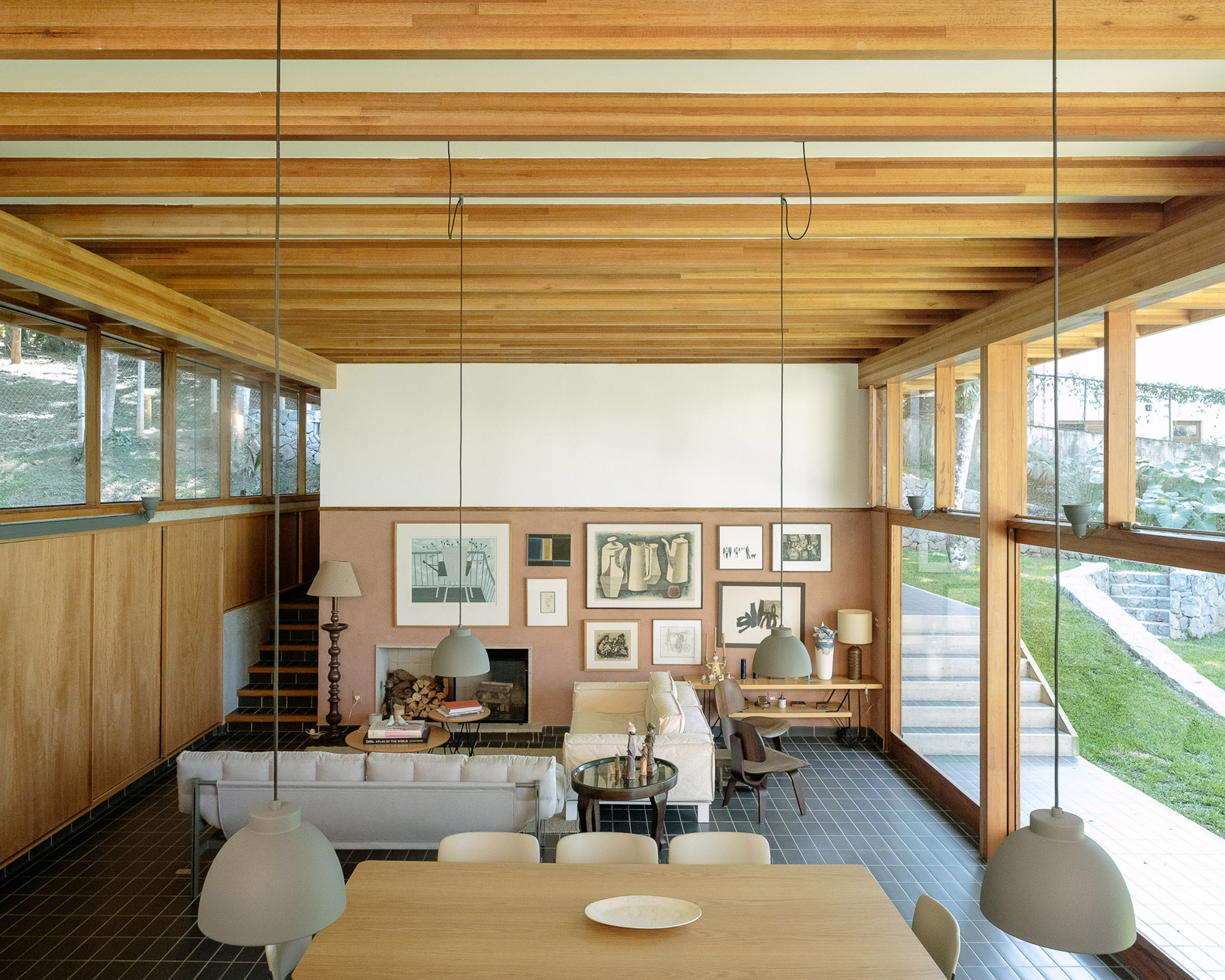 Living space with timber beams and eclectic artwork
