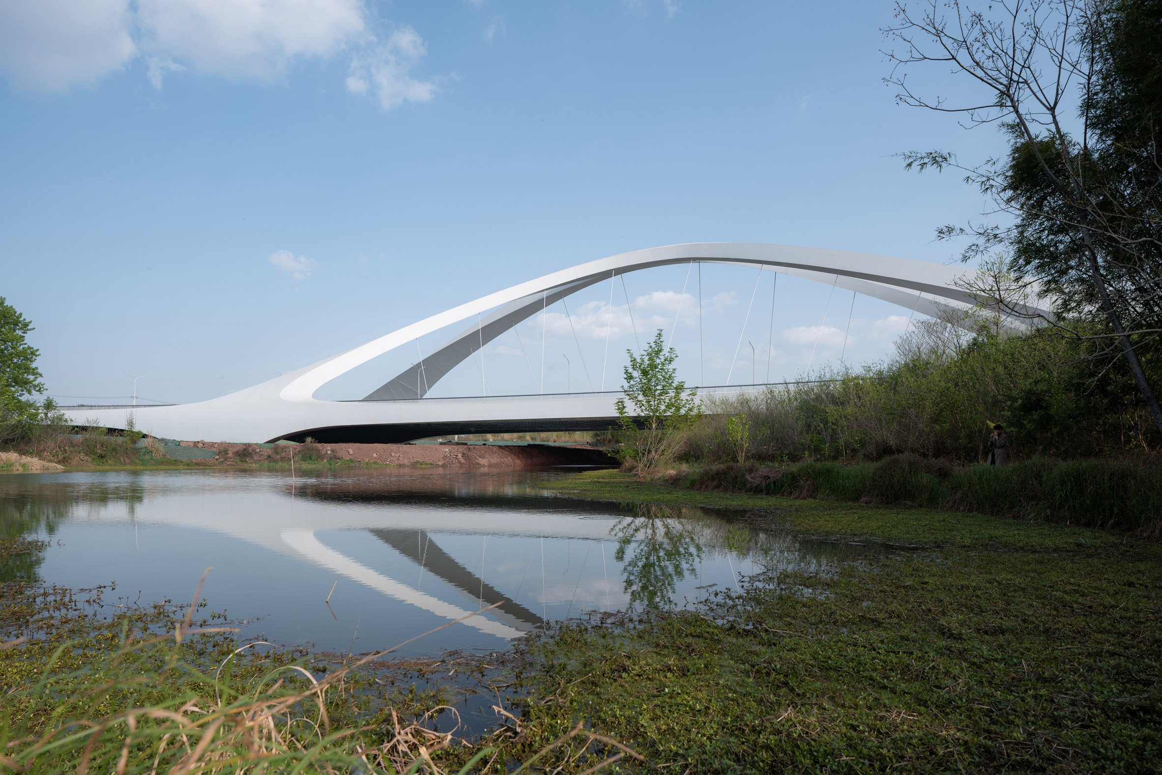 Chengdu West First Bridge reflected in the river