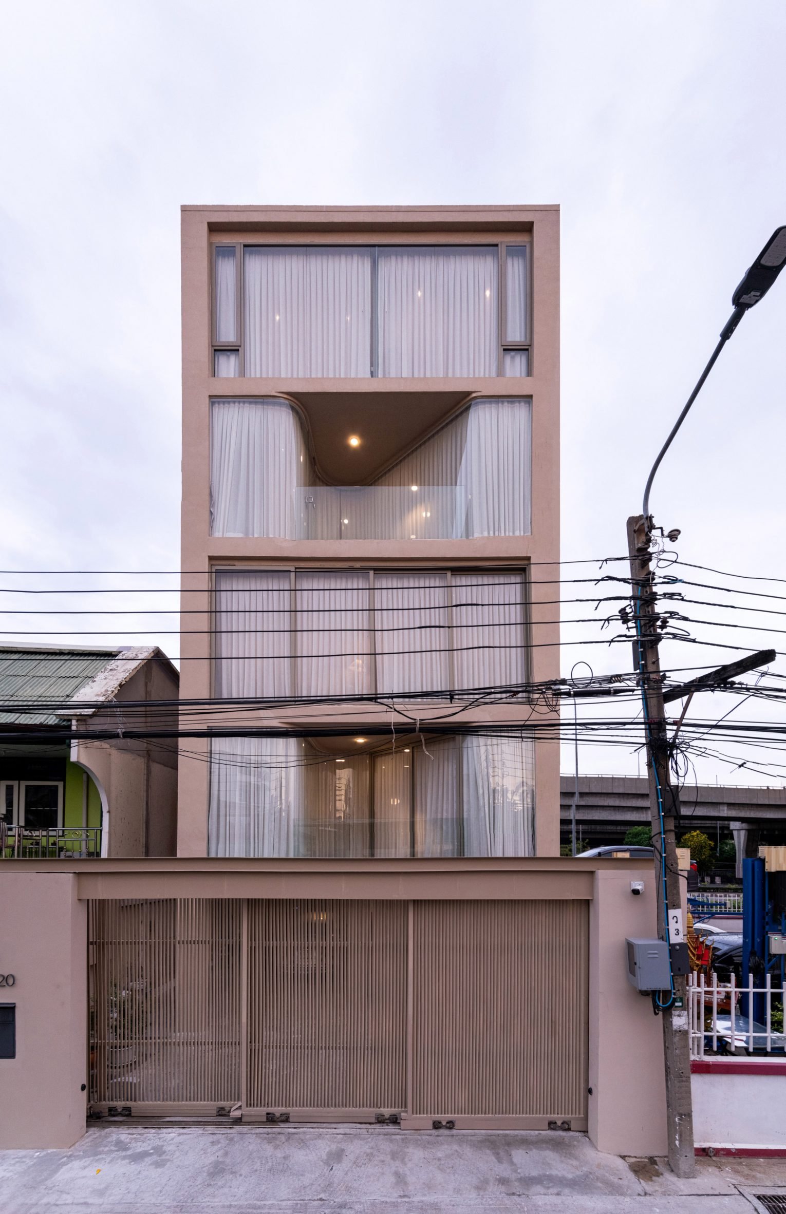 Thai home with curved glazing