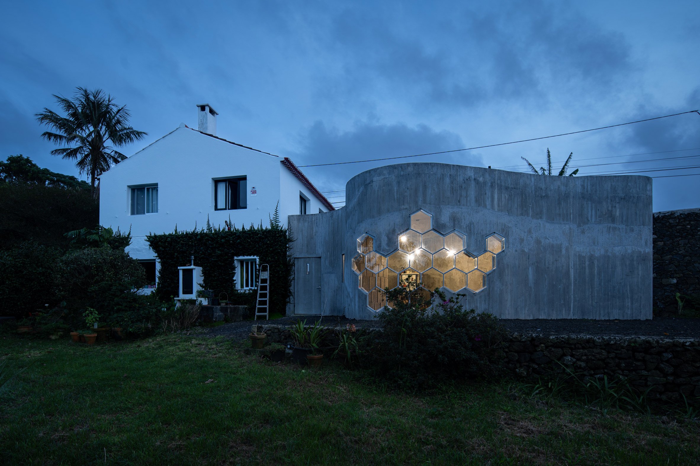 Farmhouse with concrete outbuilding