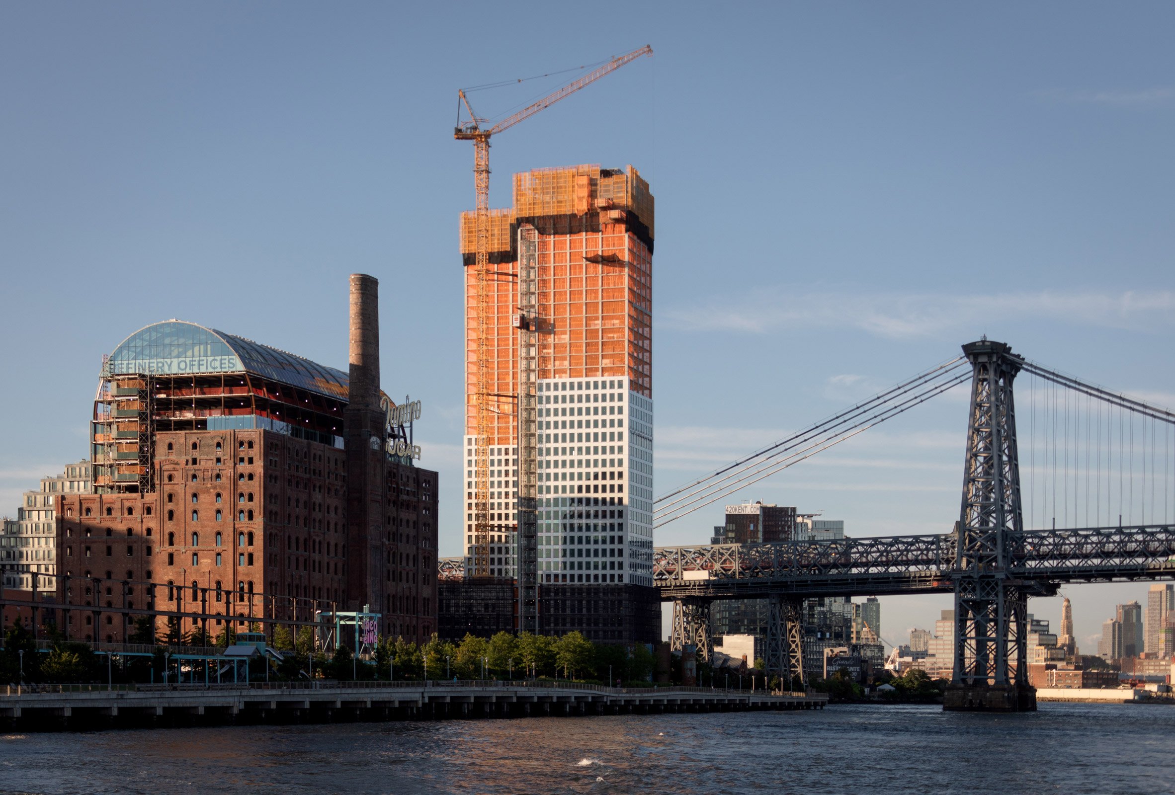 In-progress skyscrapers with Williamsburg Bridge in background