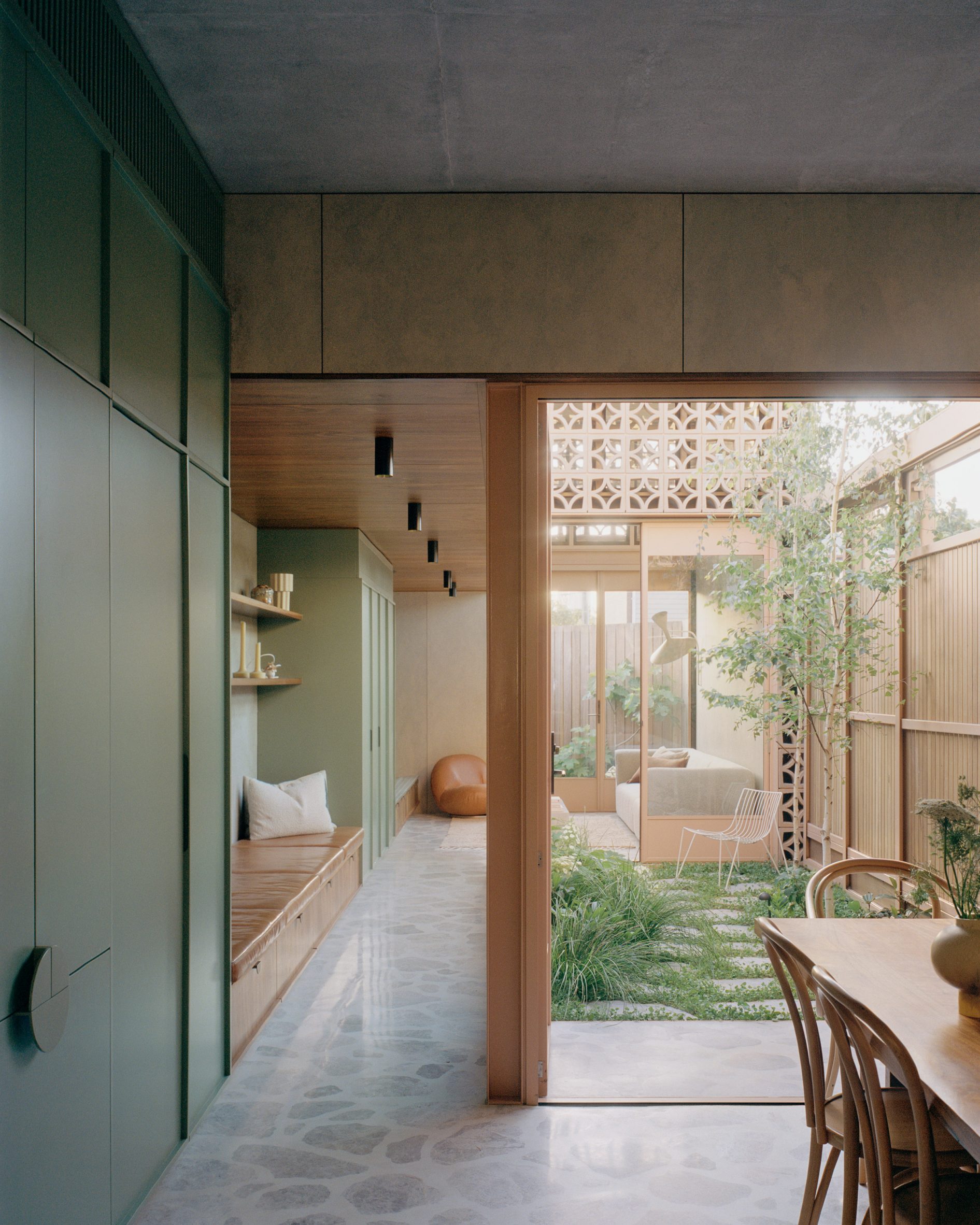 Dining room of Garden Tower House by Studio Bright