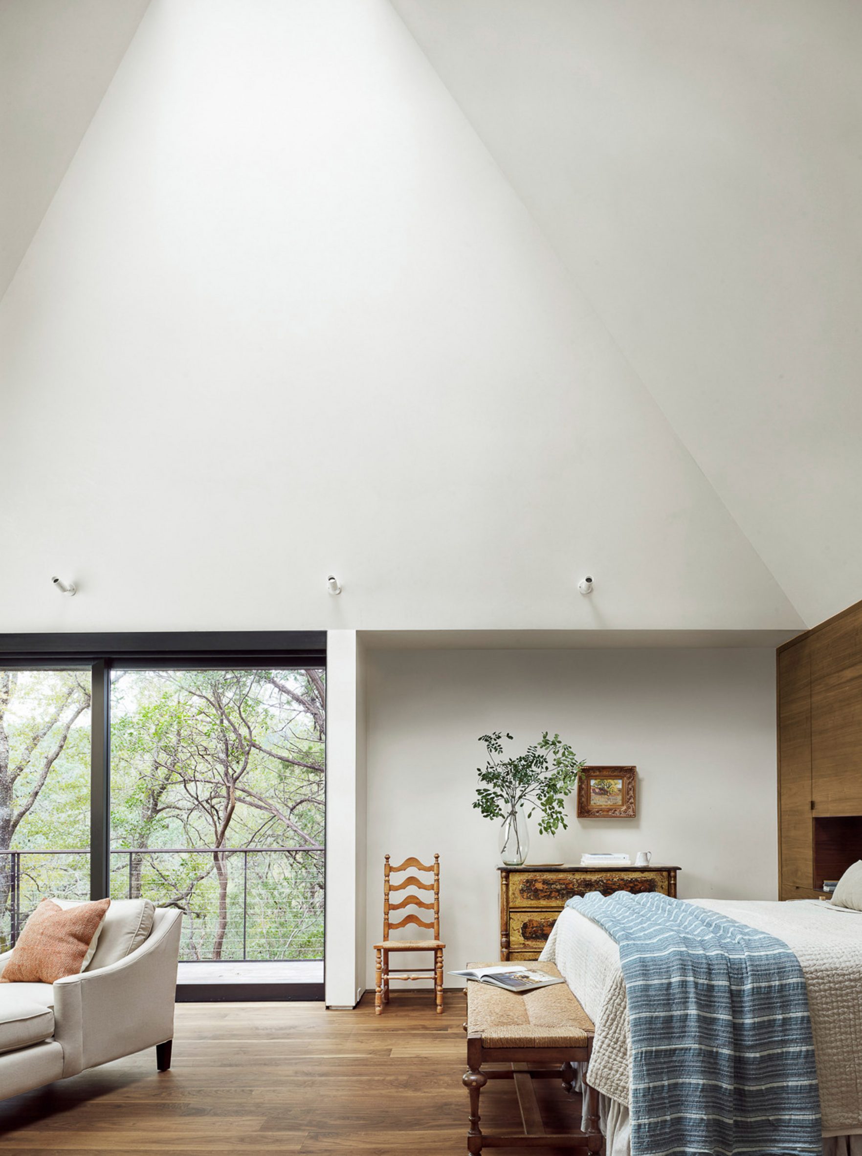 Bedroom at River Bend Residence by Lake Flato Architects