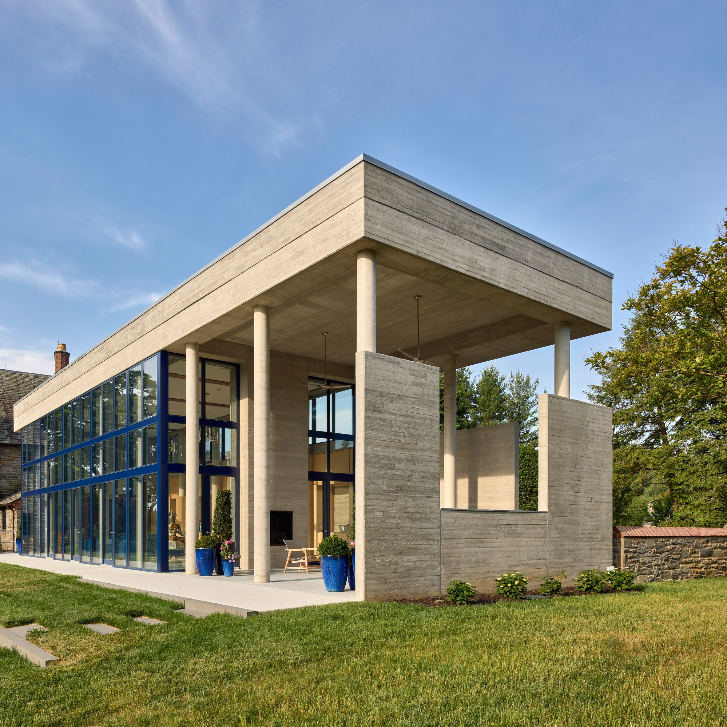 Stone-coloured concrete walls at Katzin Residence