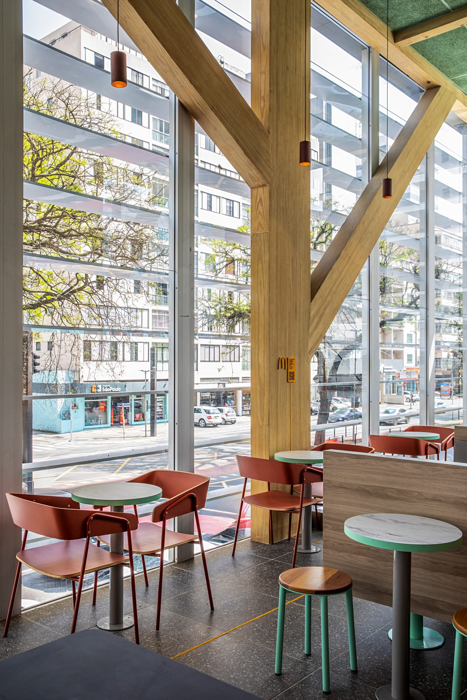 Interior seating at the mass timber McDonald's in Sao Paulo