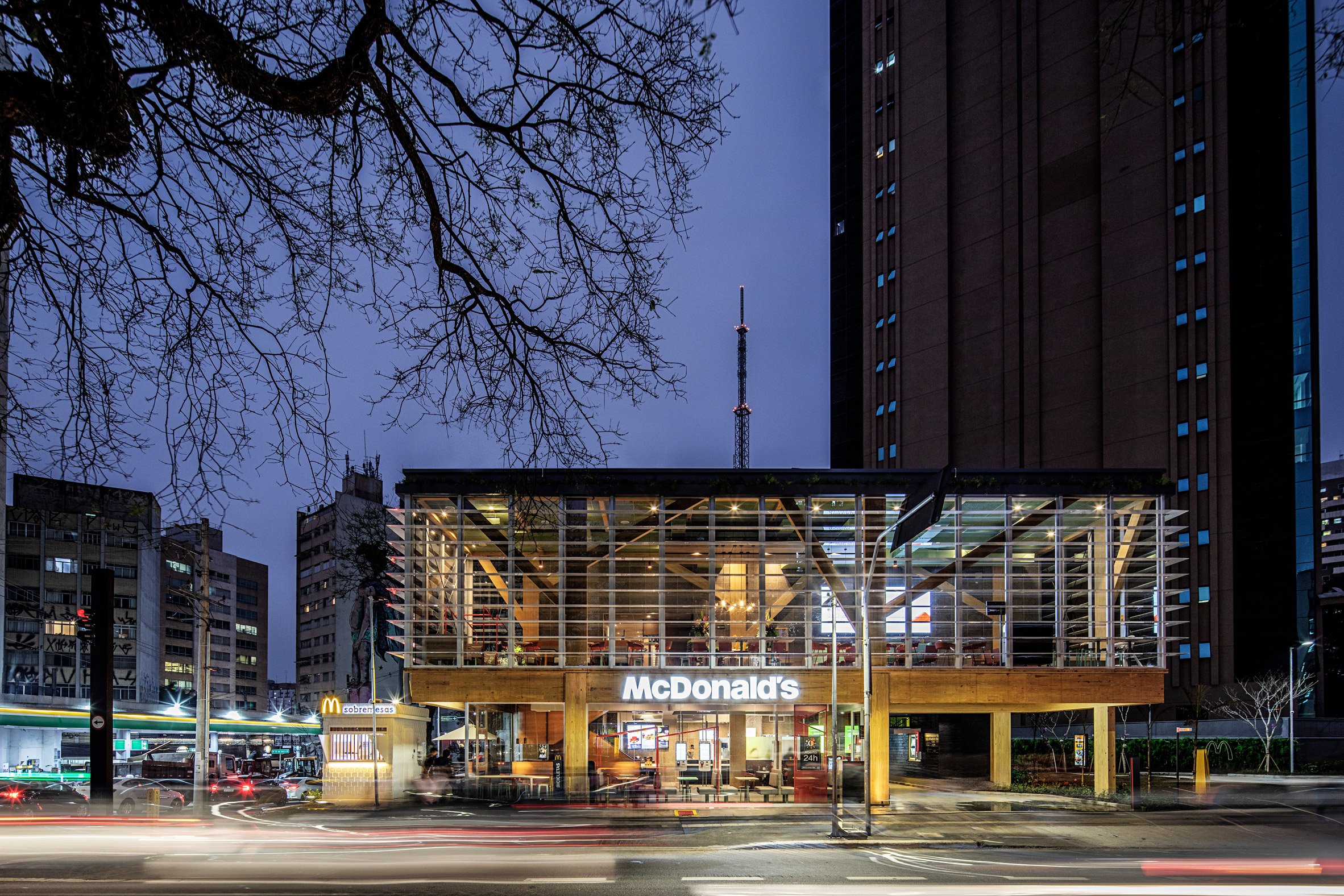 Mass timber McDonald's in Sao Paulo by Superlimao at night