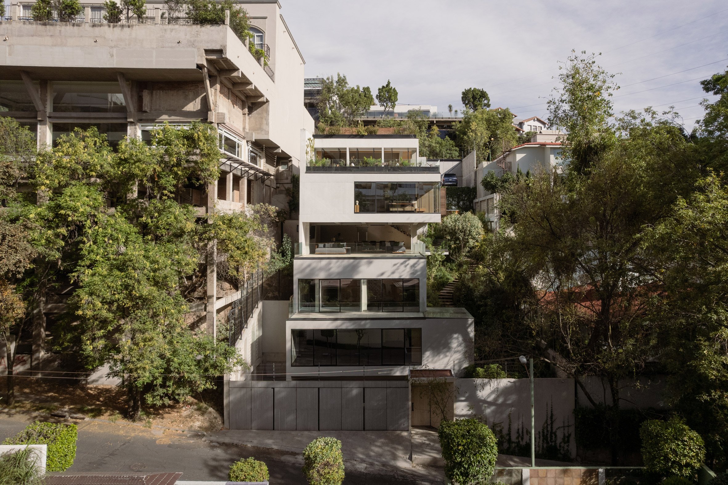 Concrete Casa Madre house on a Mexican hillside by Taller David Dana